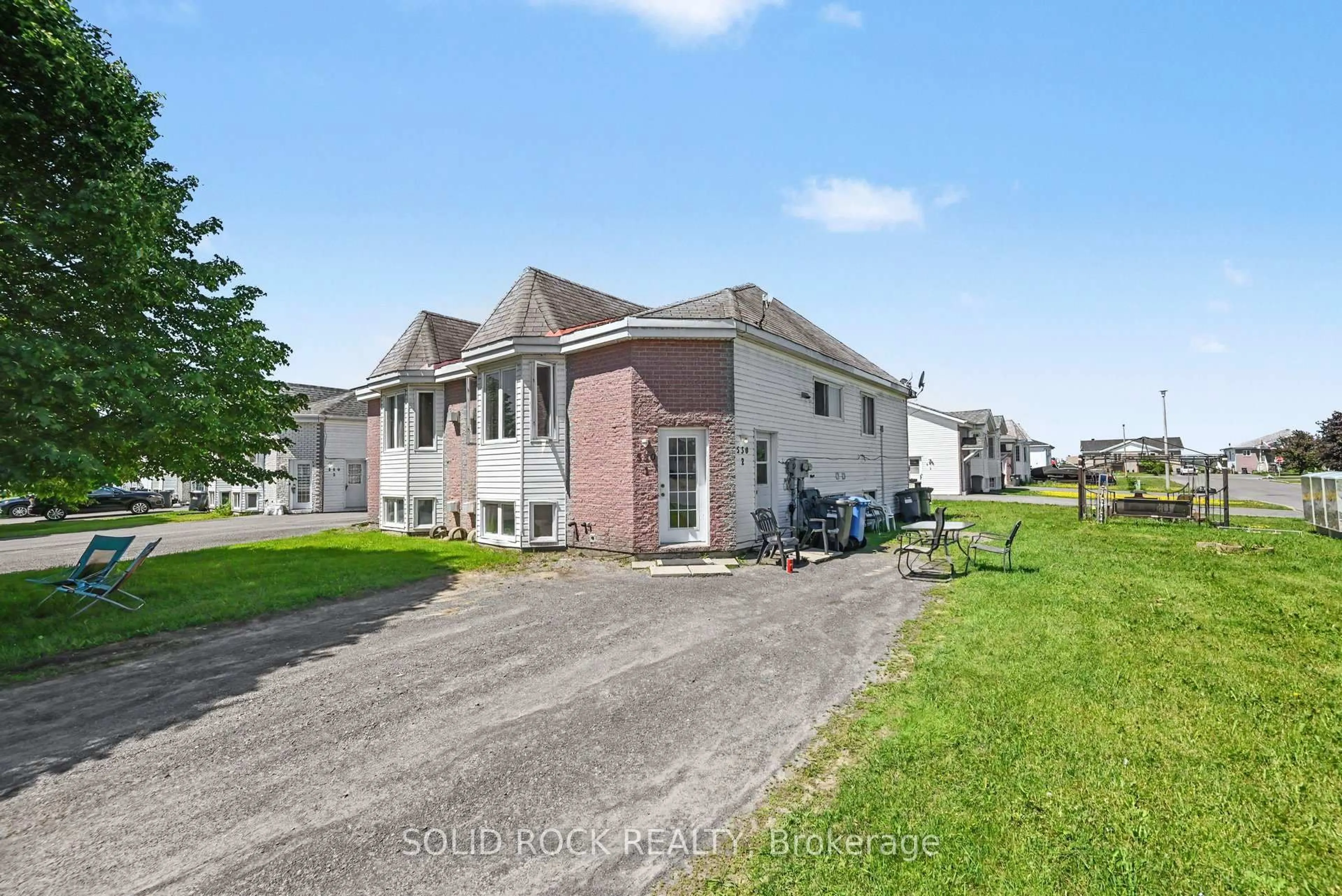 A pic from outside/outdoor area/front of a property/back of a property/a pic from drone, street for 530 Mario St, Hawkesbury Ontario K6A 3V4