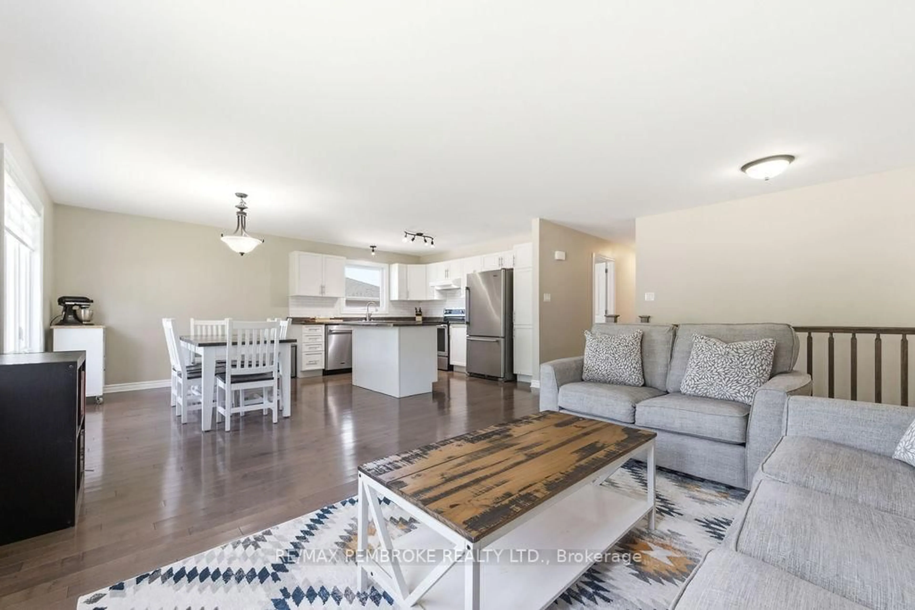 Open concept kitchen, wood/laminate floor for 74 Oak Ave, Petawawa Ontario K8H 0B5