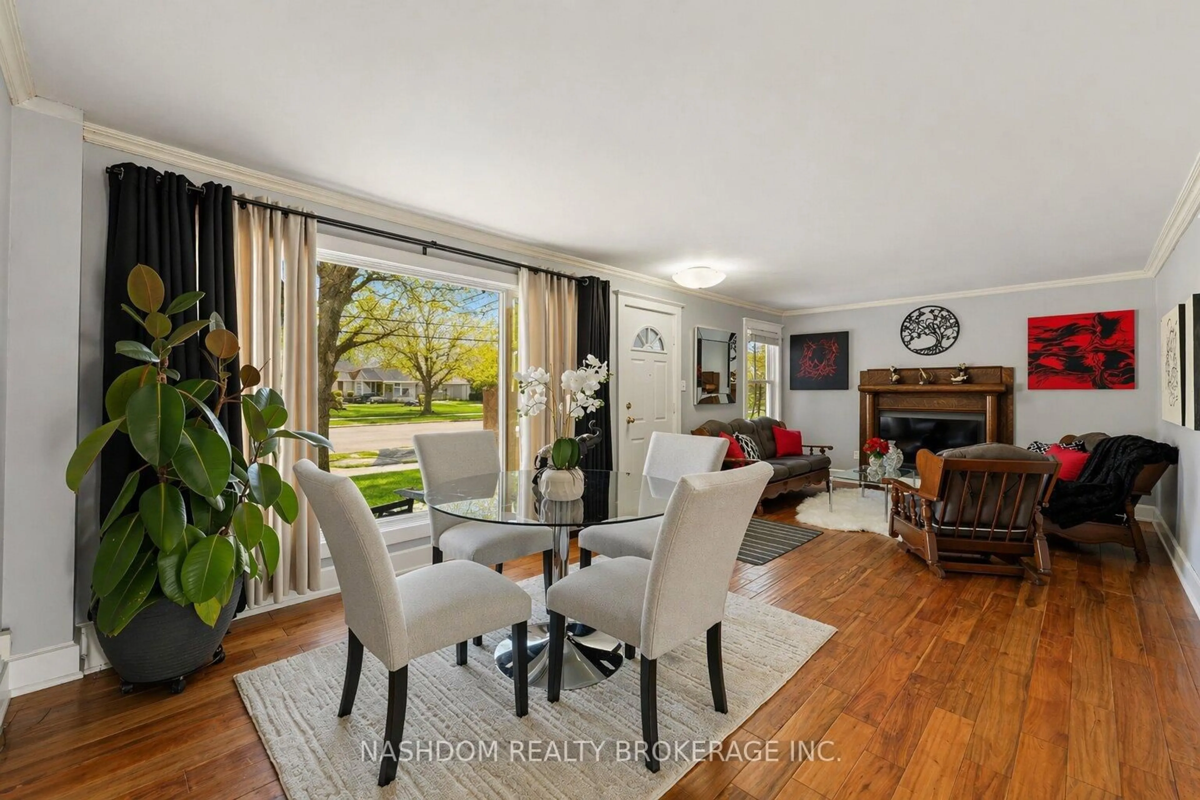 Dining room, wood/laminate floor for 31 Hunter St, Hamilton Ontario L9H 1E5