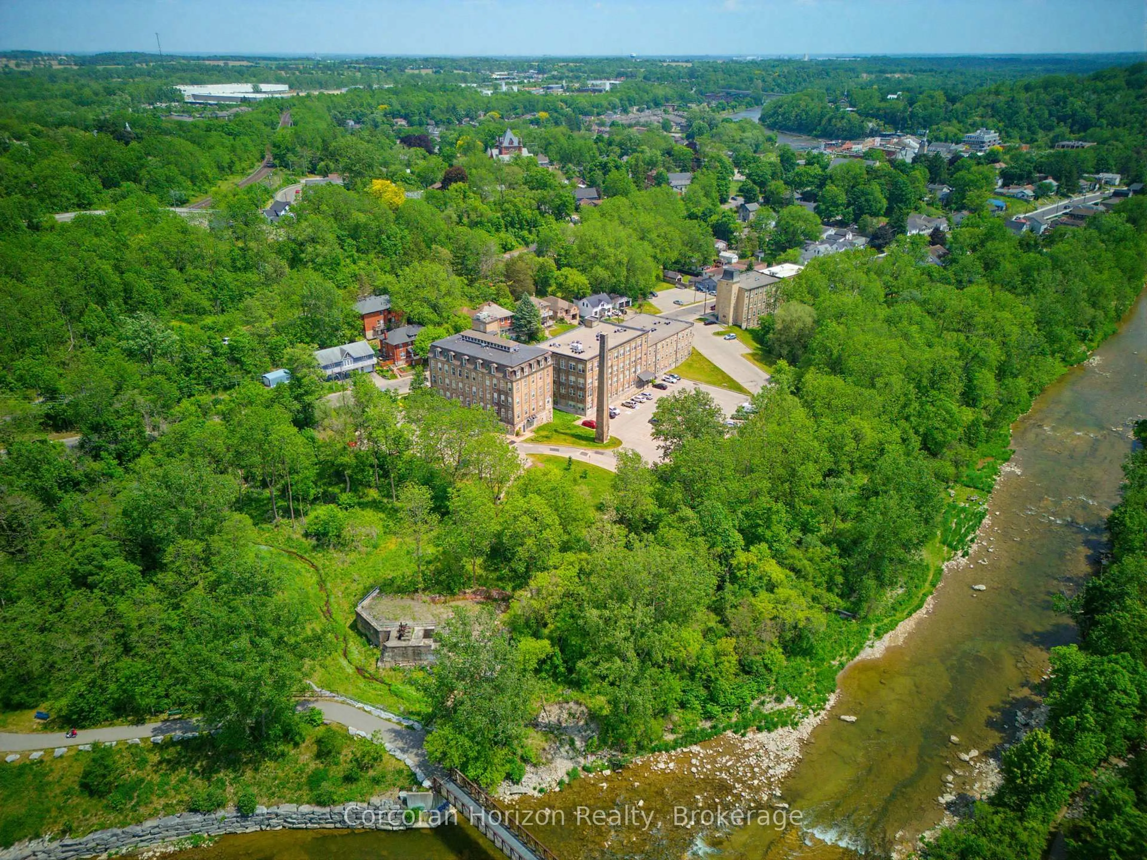 A pic from outside/outdoor area/front of a property/back of a property/a pic from drone, water/lake/river/ocean view for 140 West River St #301, Brant Ontario N3L 0B7