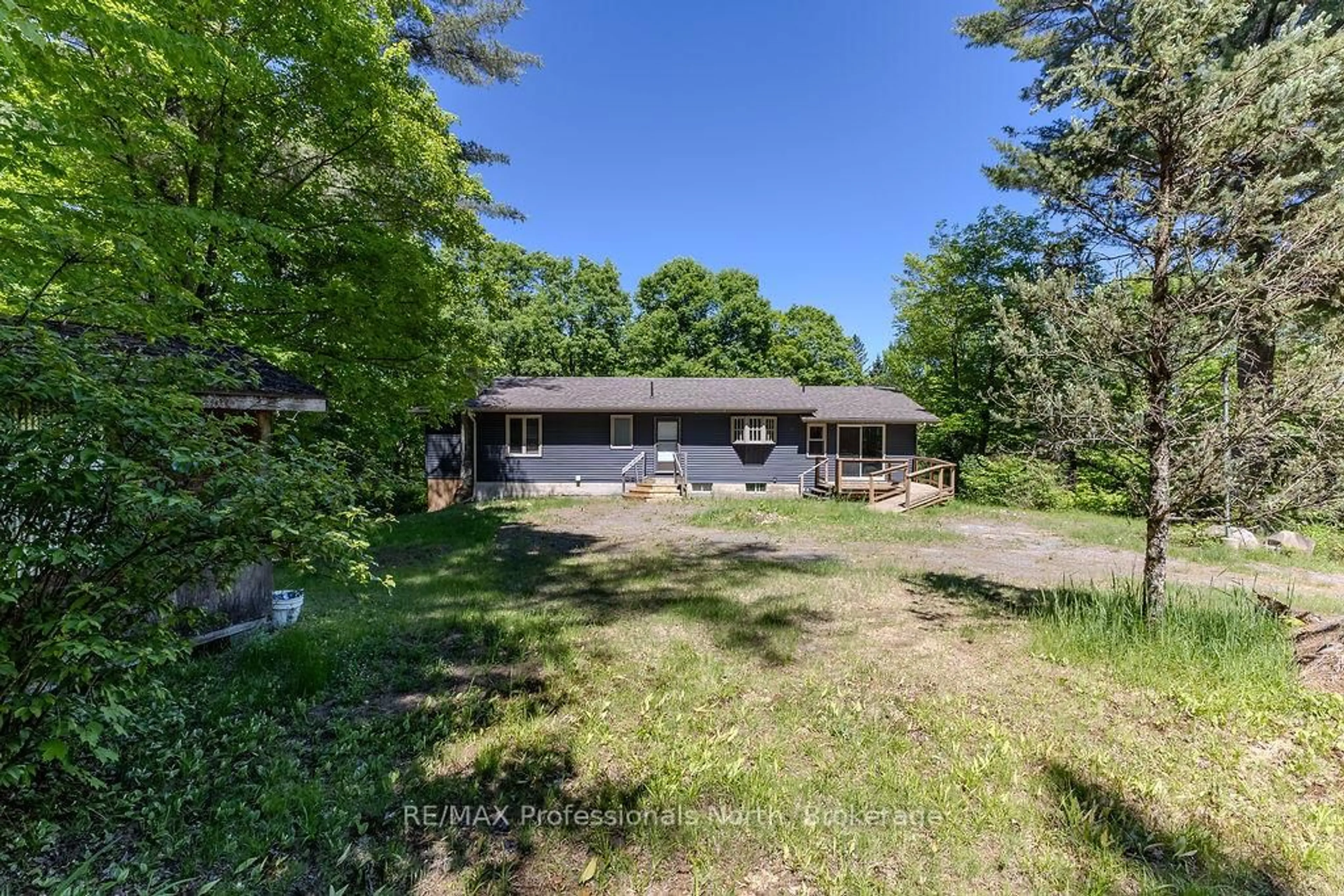 A pic from outside/outdoor area/front of a property/back of a property/a pic from drone, unknown for 128 Old Muskoka Rd, Perry Ontario P0A 1J0