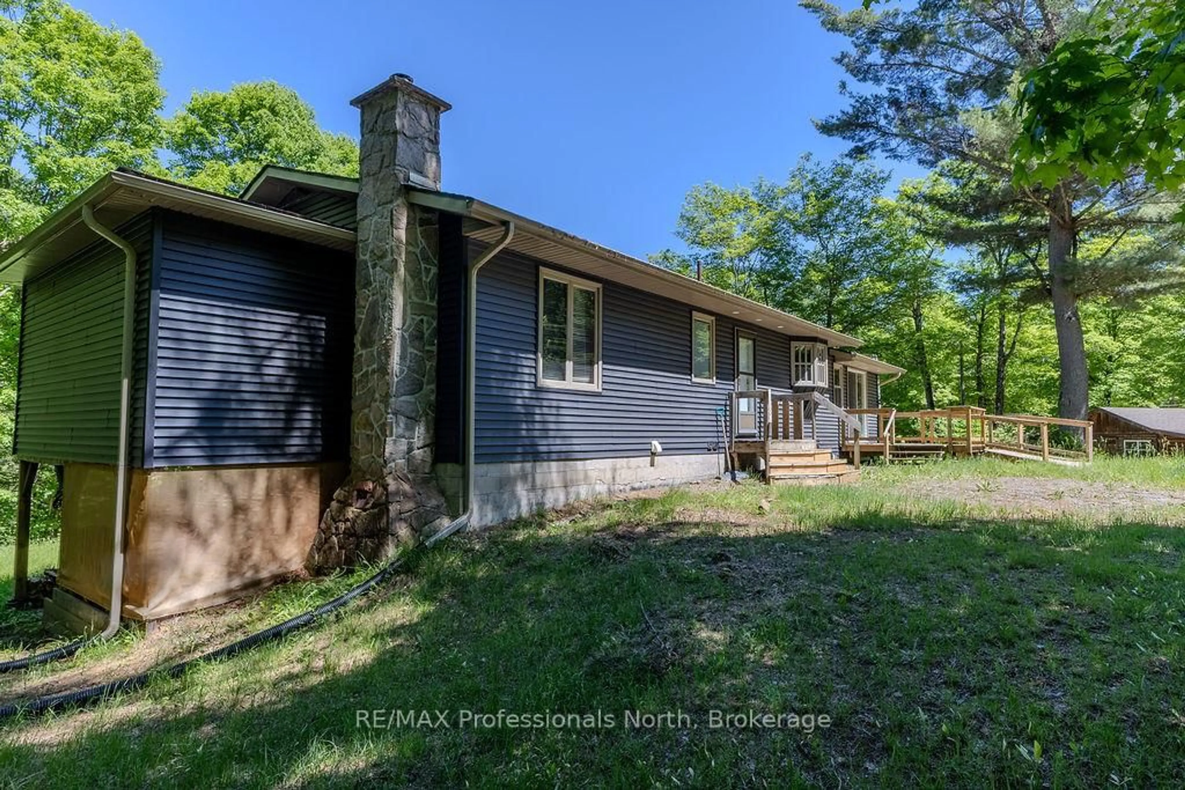 A pic from outside/outdoor area/front of a property/back of a property/a pic from drone, street for 128 Old Muskoka Rd, Perry Ontario P0A 1J0