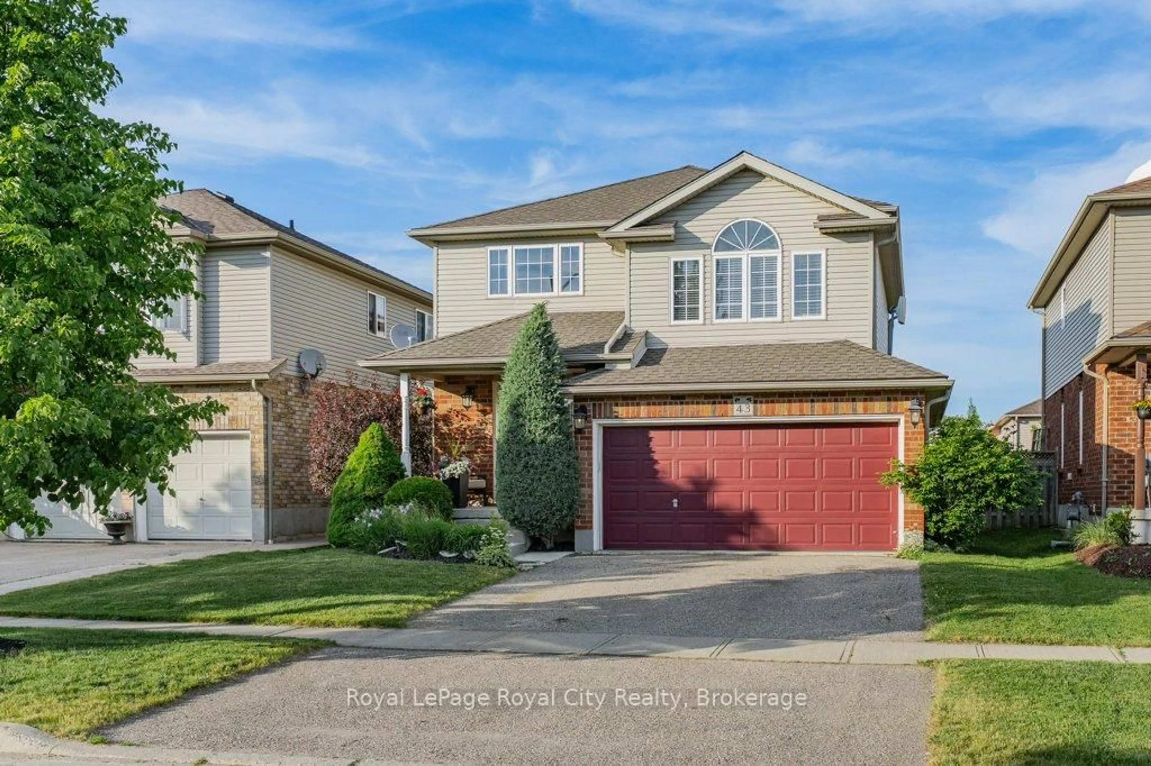 Home with vinyl exterior material, street for 43 Brenneman Dr, Wilmot Ontario N3A 4M9