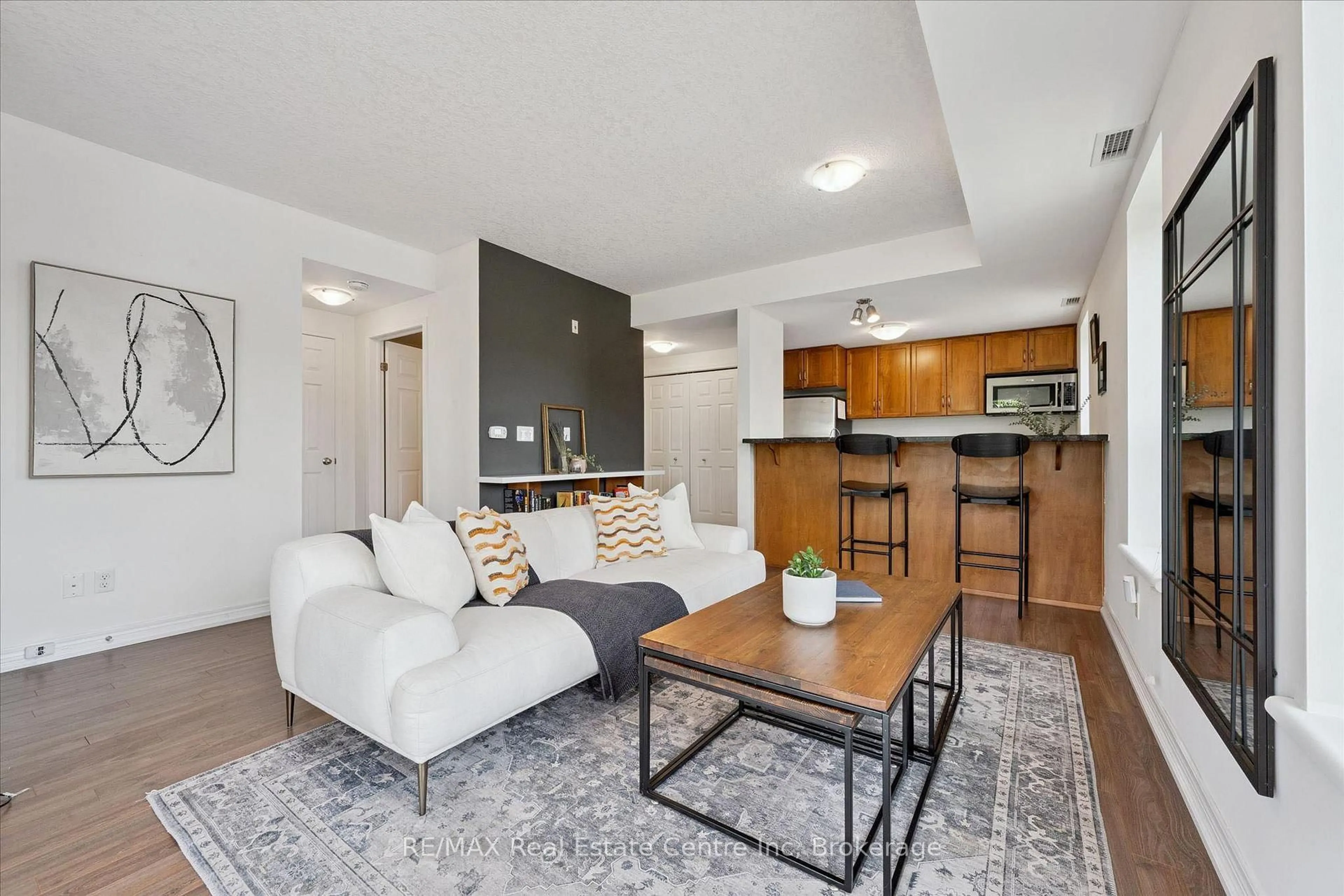 Living room with furniture, unknown for 901 PAISLEY Rd #309, Guelph Ontario N1K 0A7