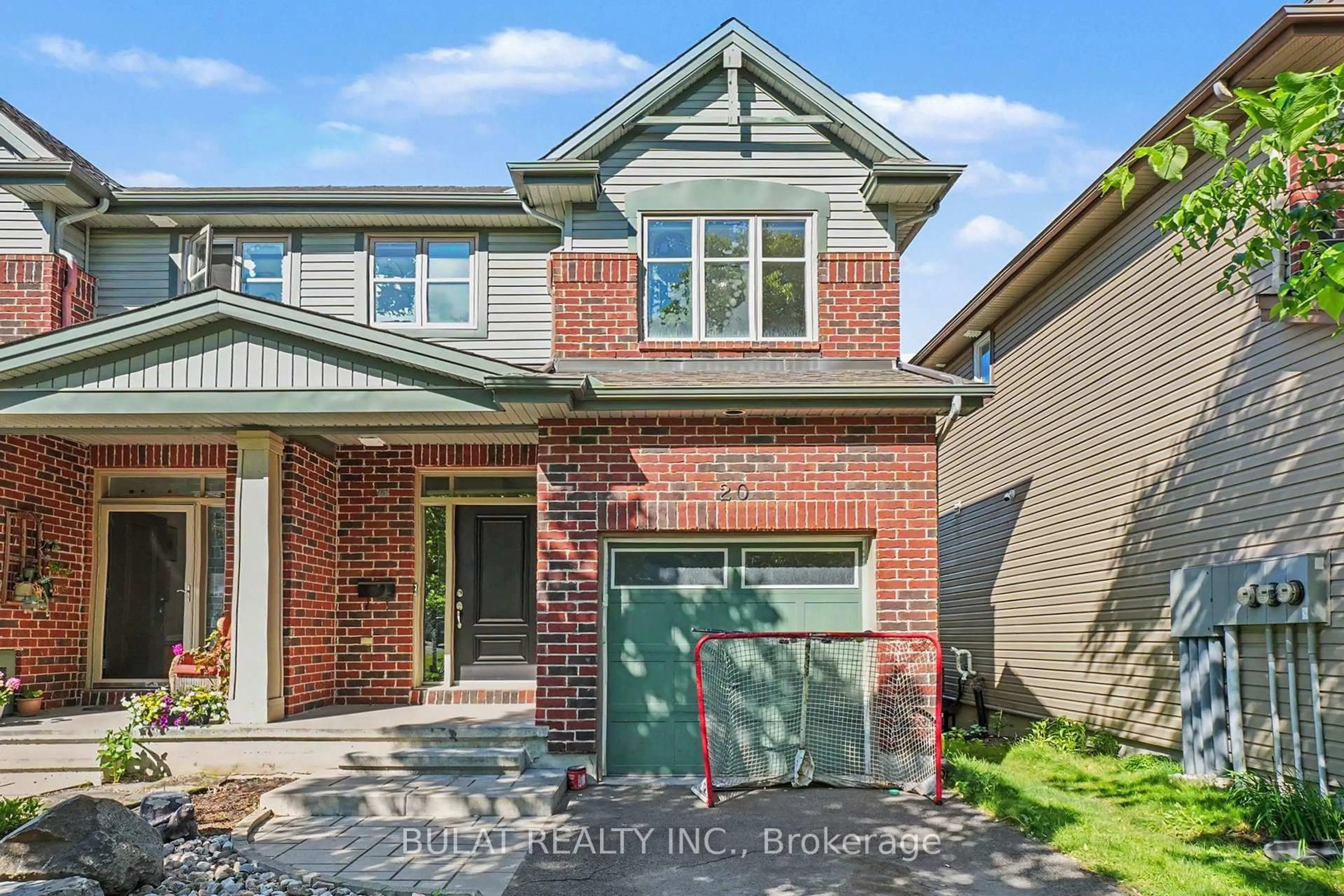 Home with brick exterior material, street for 20 Mccooeye Lane, Ottawa Ontario K2S 1B9