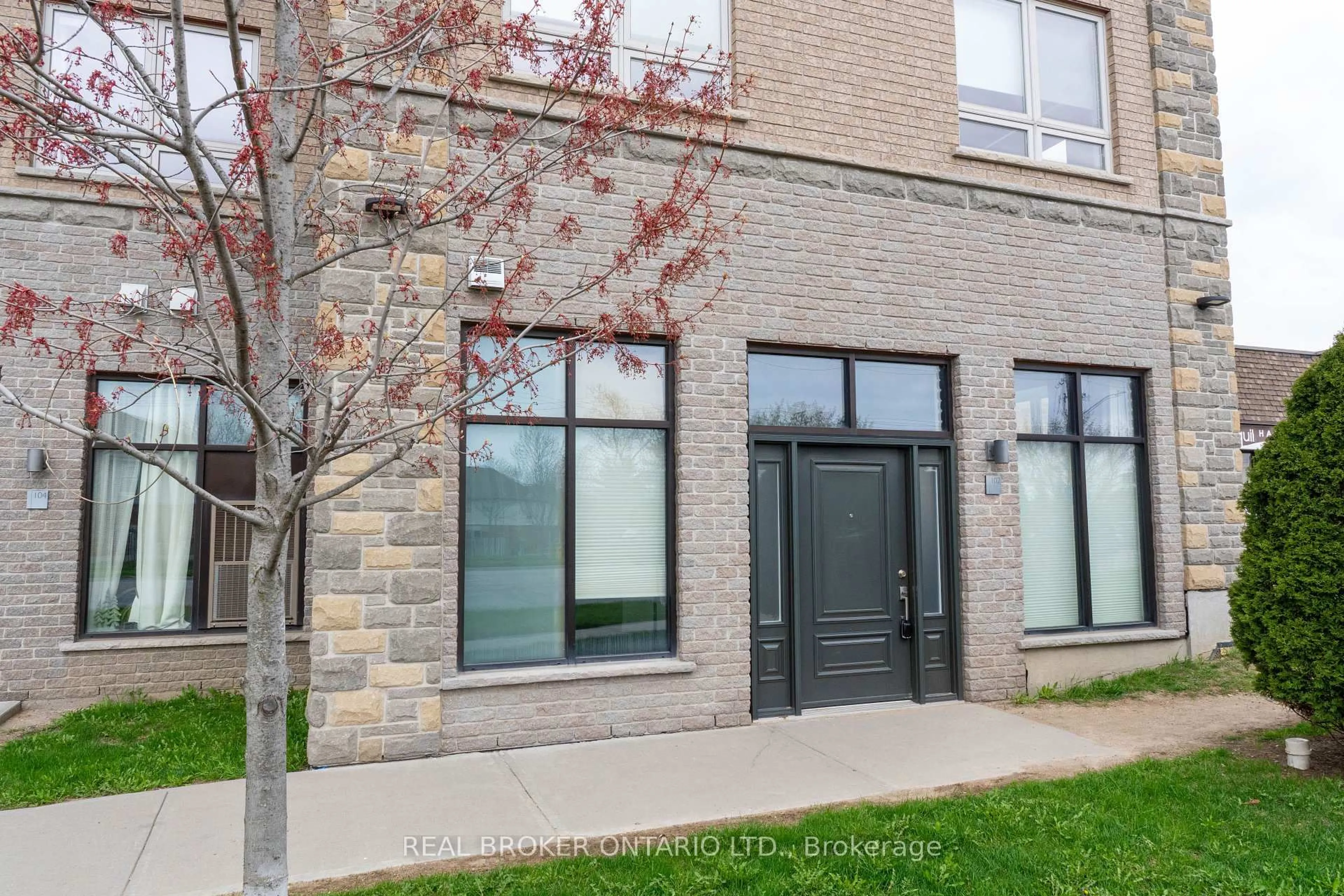 Home with brick exterior material, street for 904 Paisley Rd #102, Guelph Ontario N1K 0C6