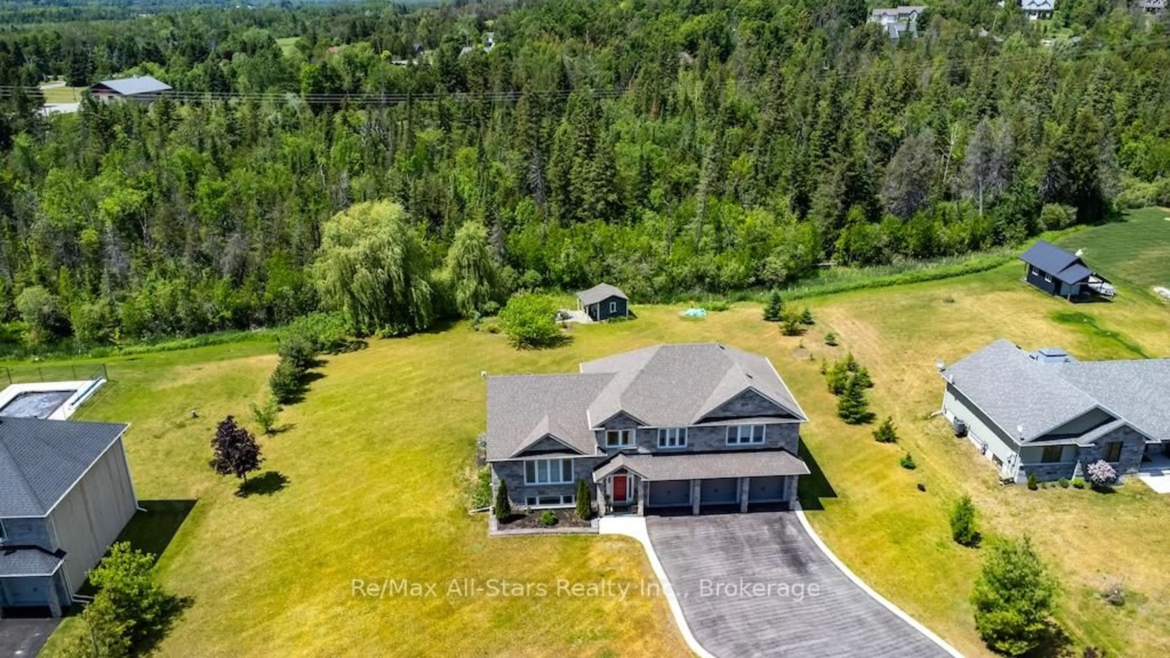 A pic from outside/outdoor area/front of a property/back of a property/a pic from drone, mountain view for 15 Rustlewood Ave, Kawartha Lakes Ontario L0A 1A0