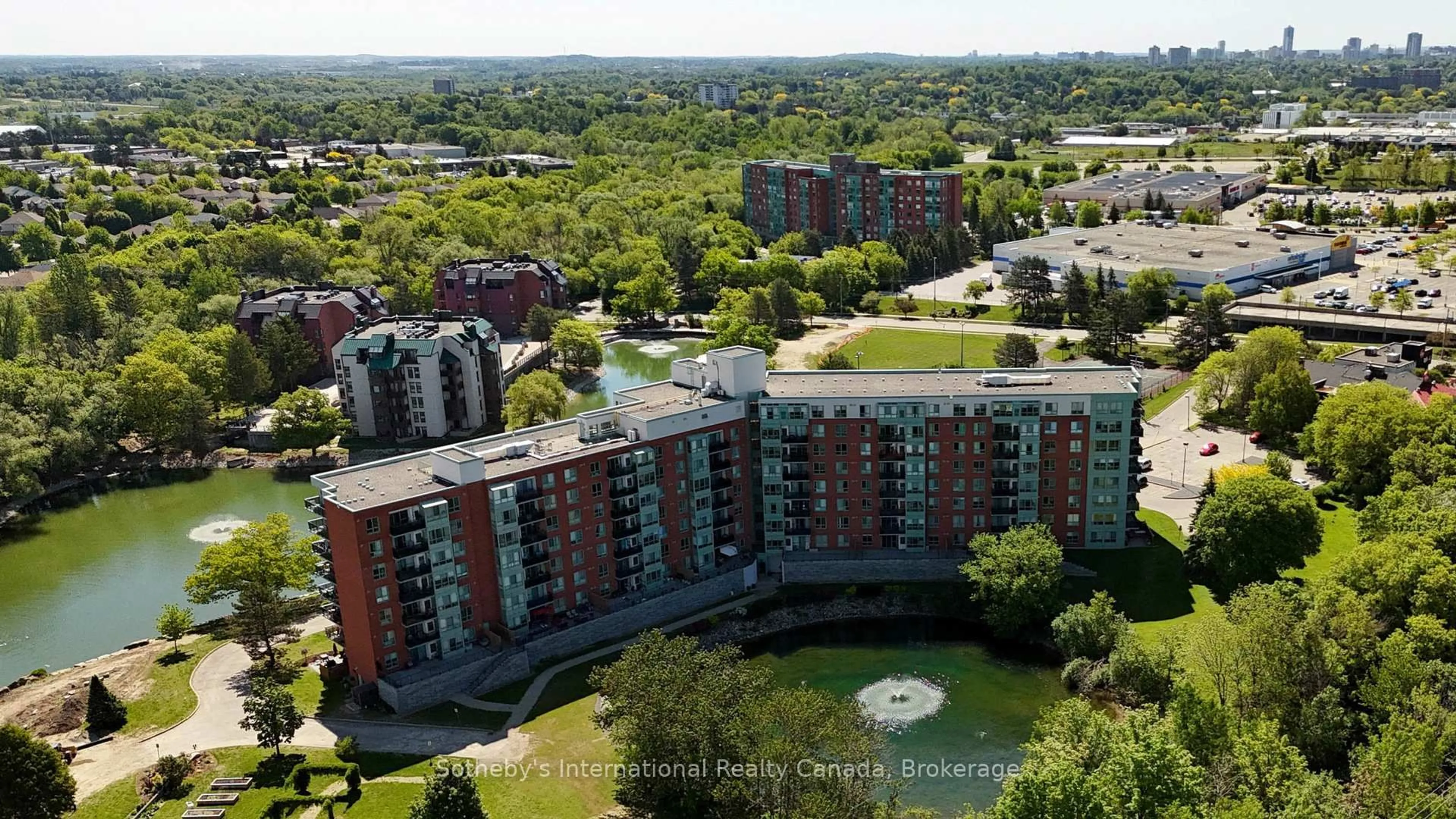 A pic from outside/outdoor area/front of a property/back of a property/a pic from drone, city buildings view from balcony for 30 Blue Springs Dr #102, Waterloo Ontario N2J 4T2