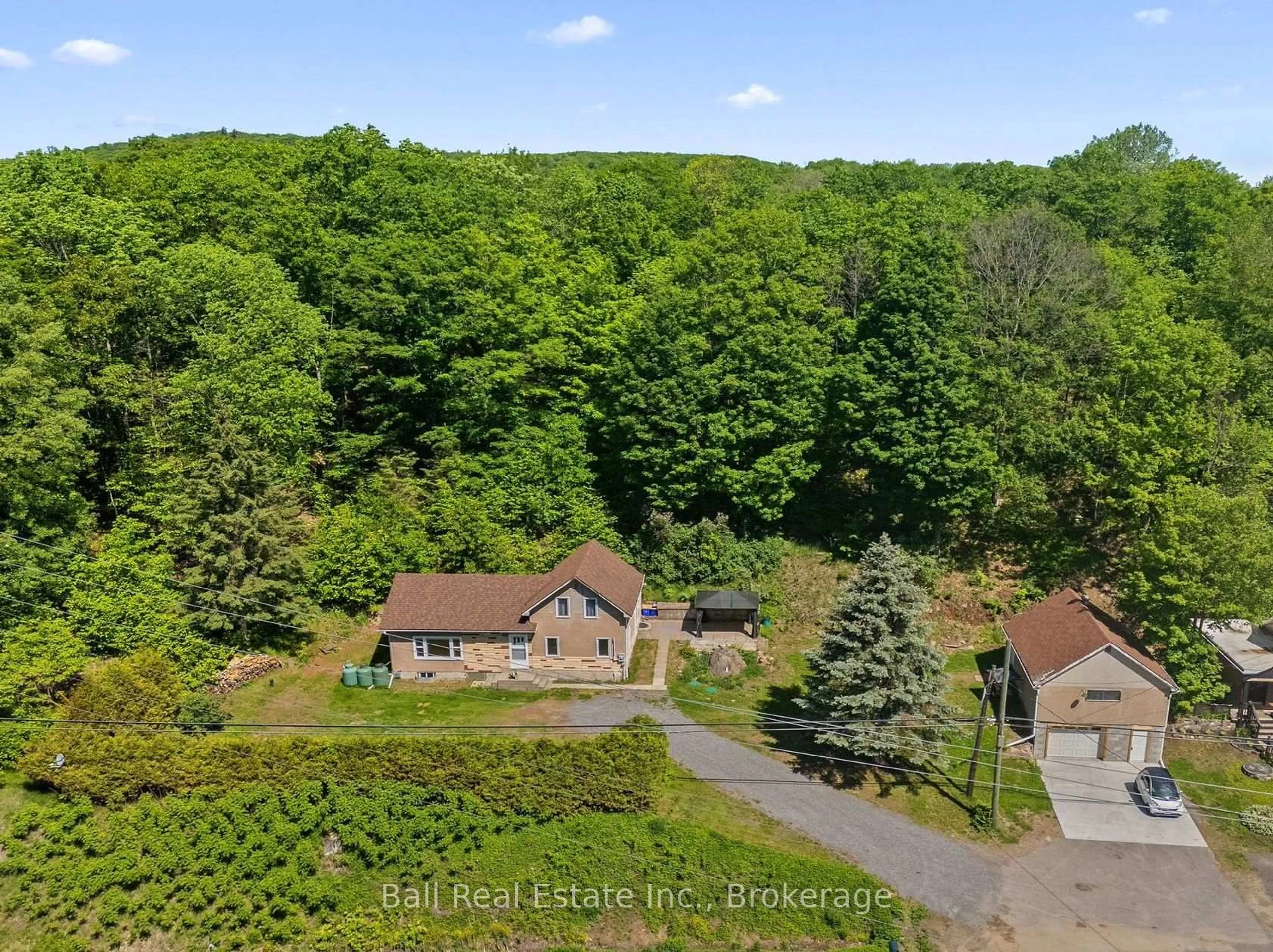 A pic from outside/outdoor area/front of a property/back of a property/a pic from drone, forest/trees view for 192 Monck St, Bancroft Ontario K0L 1C0