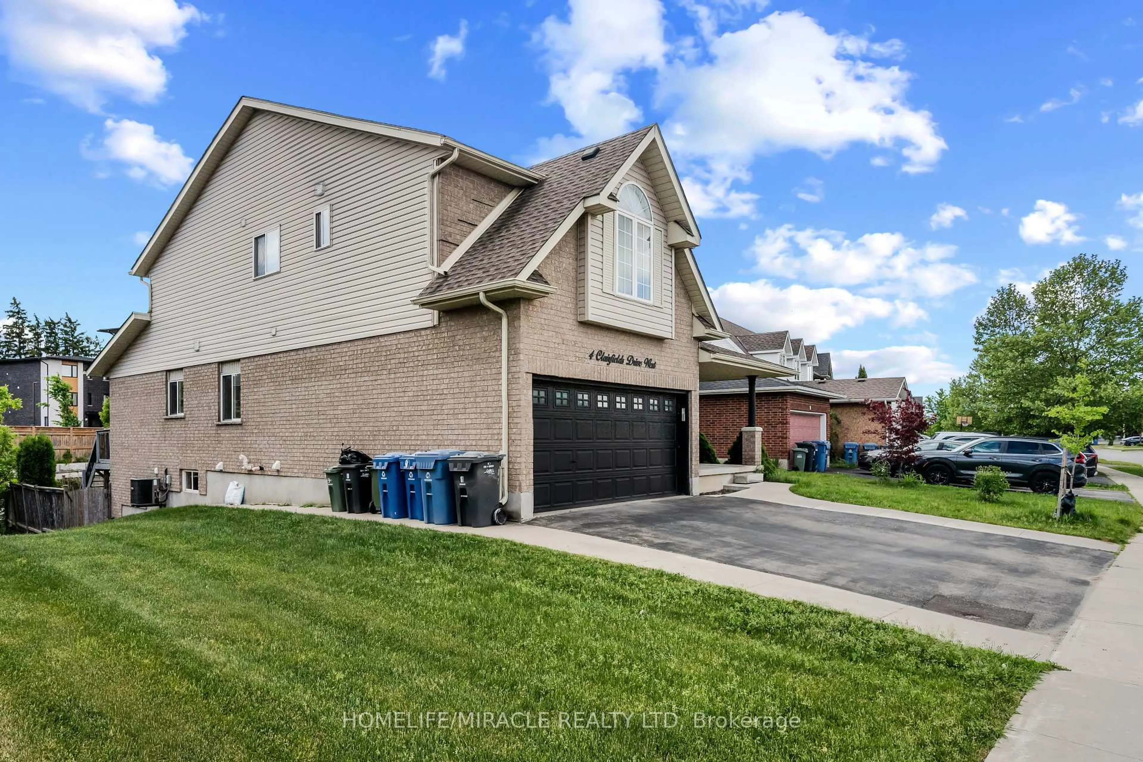 Home with brick exterior material, street for 4 Clairfields Dr, Guelph Ontario N1G 5H5