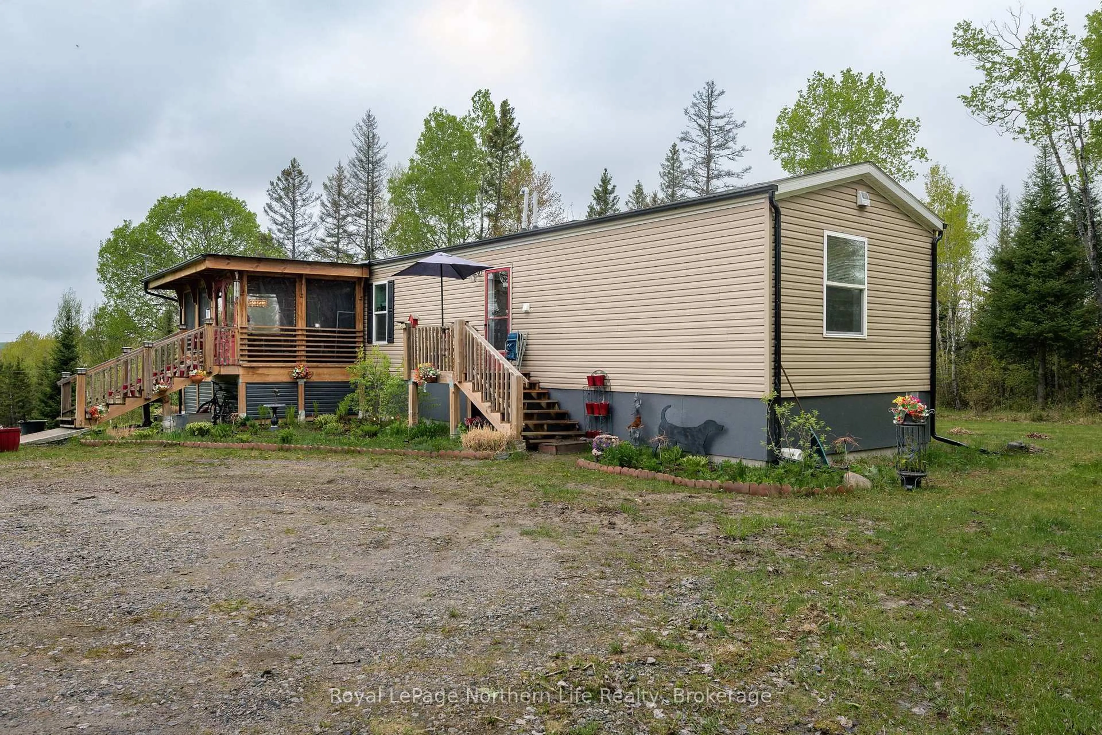 A pic from outside/outdoor area/front of a property/back of a property/a pic from drone, unknown for 5127 Highway 534, Nipissing Ontario P0H 1W0