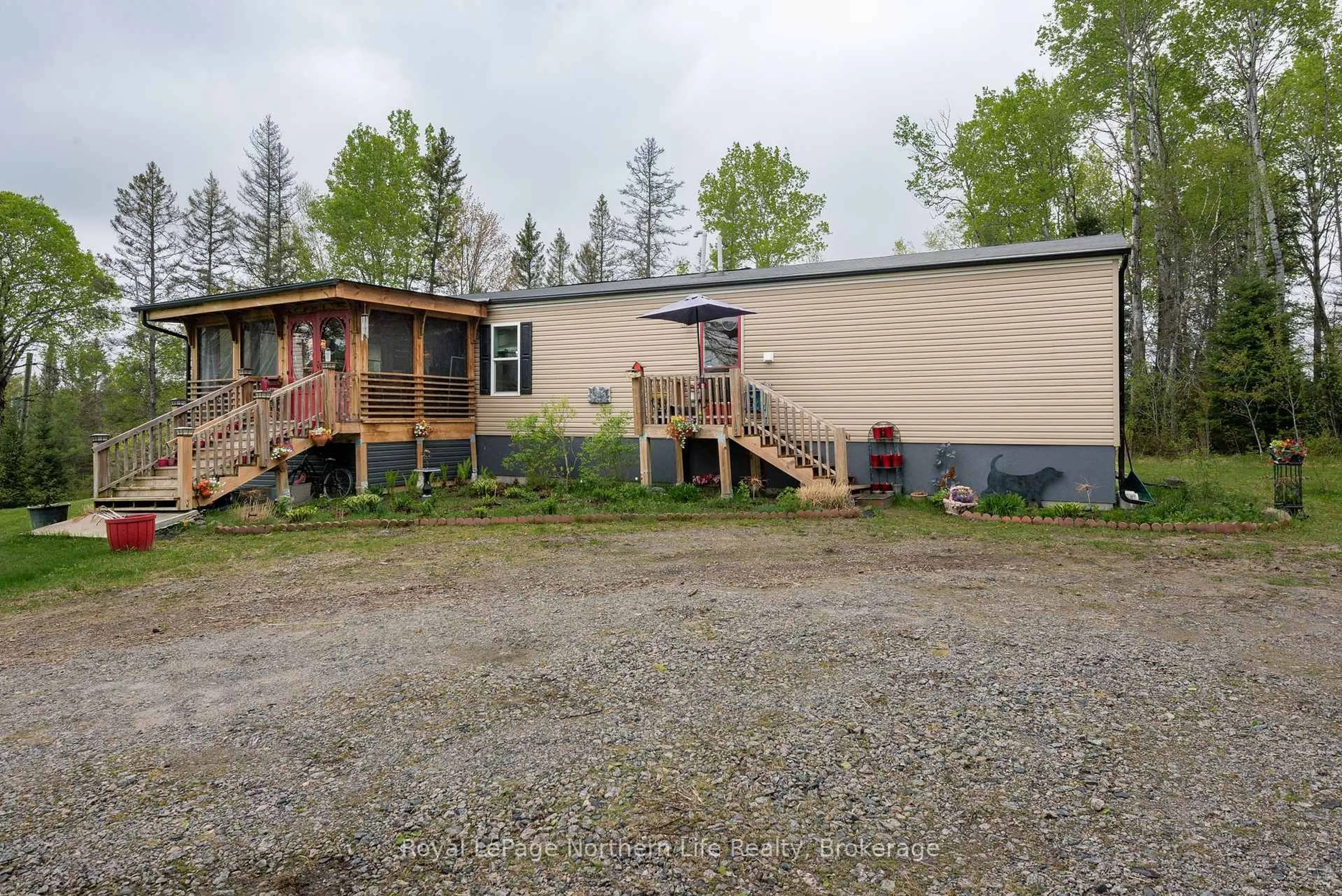 A pic from outside/outdoor area/front of a property/back of a property/a pic from drone, unknown for 5127 Highway 534, Nipissing Ontario P0H 1W0