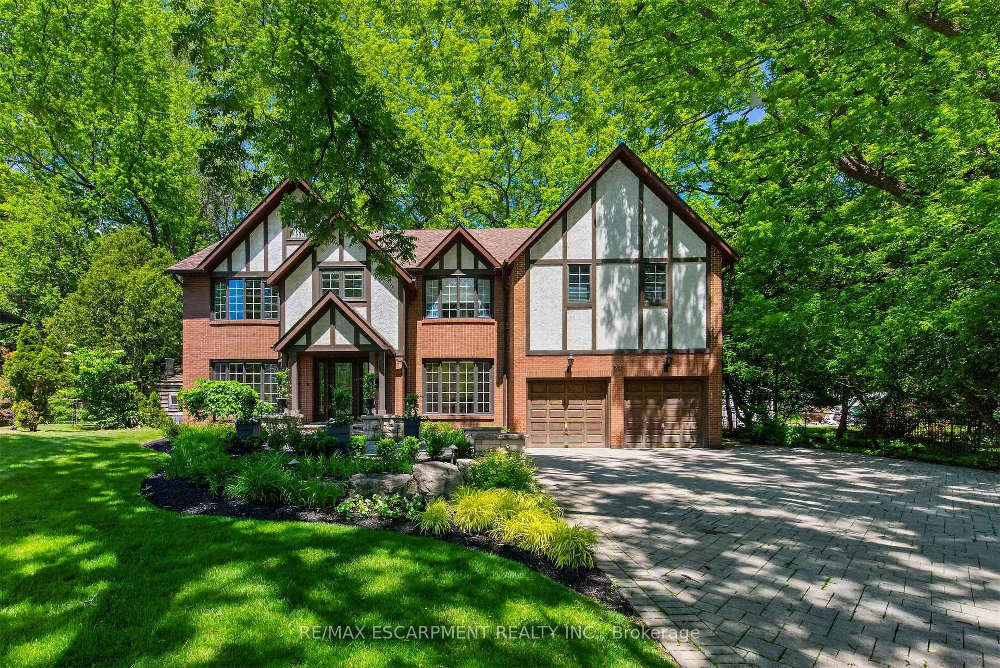 Home with brick exterior material, street for 23 Lantern Lane, Hamilton Ontario L9H 6N9