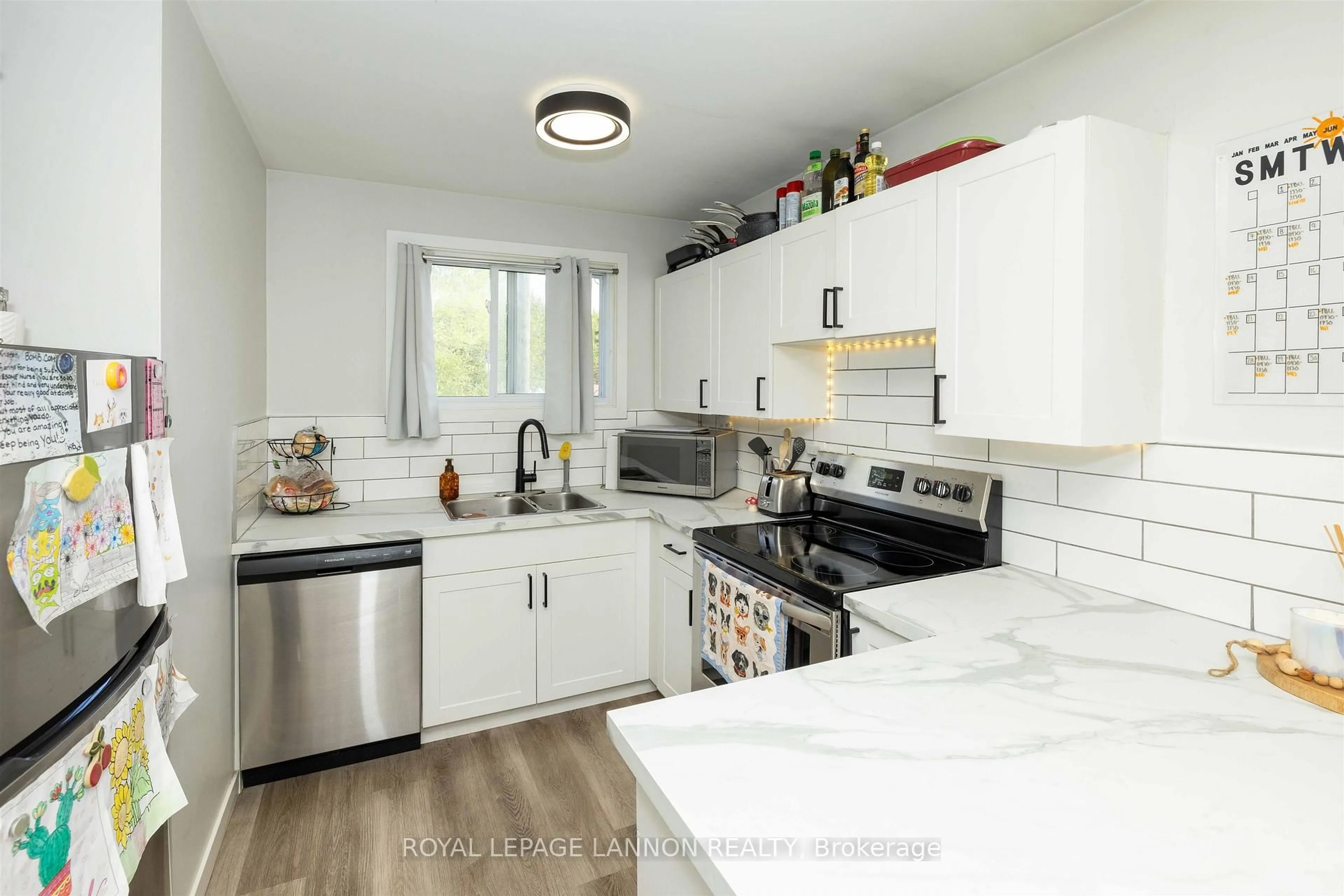 Open concept kitchen, ceramic/tile floor for 853-855 HUDSON Ave, Thunder Bay Ontario P7A 6J5