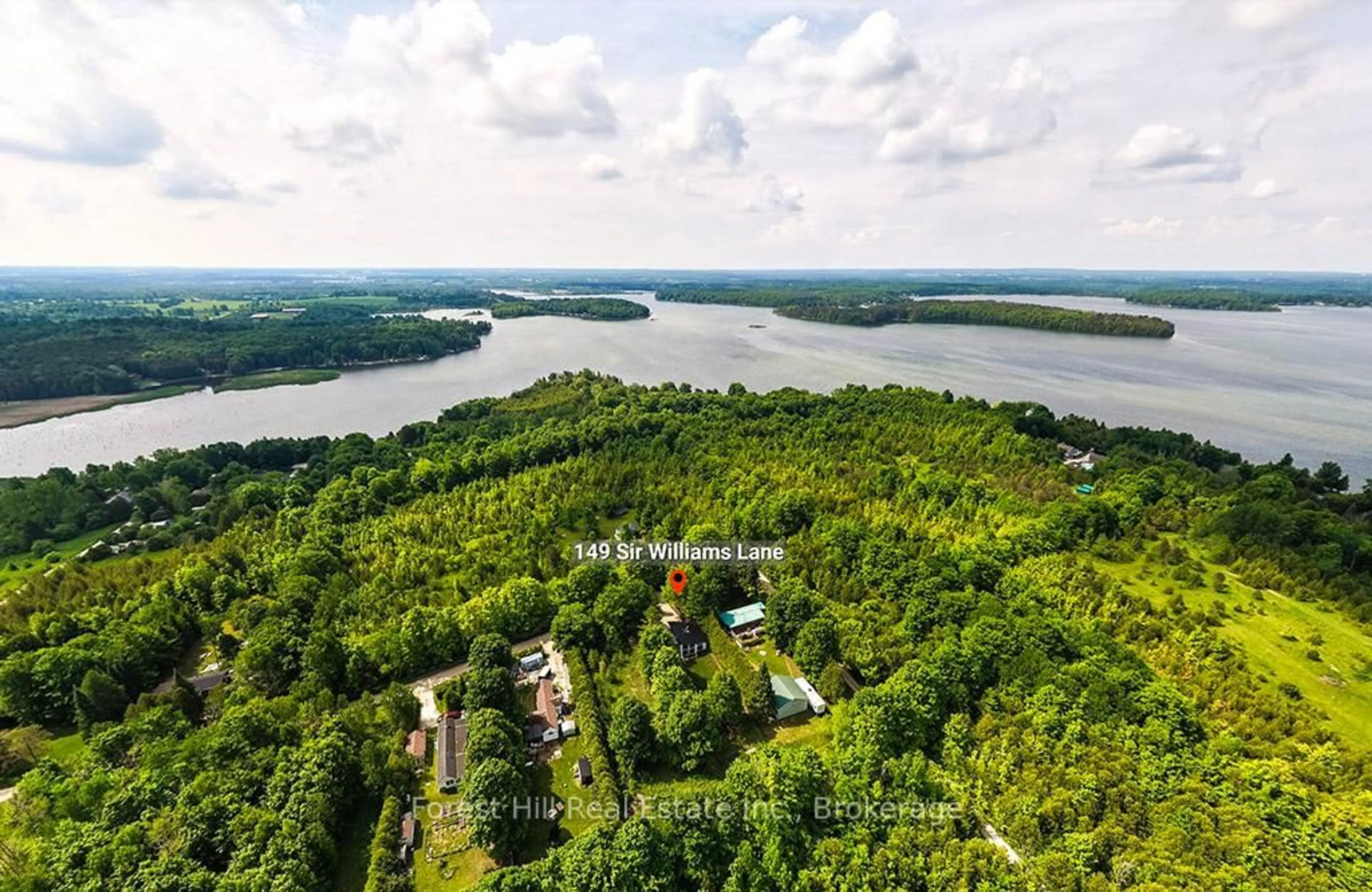 A pic from outside/outdoor area/front of a property/back of a property/a pic from drone, water/lake/river/ocean view for 149 Sir William's Lane, Grey Highlands Ontario N0C 1E0