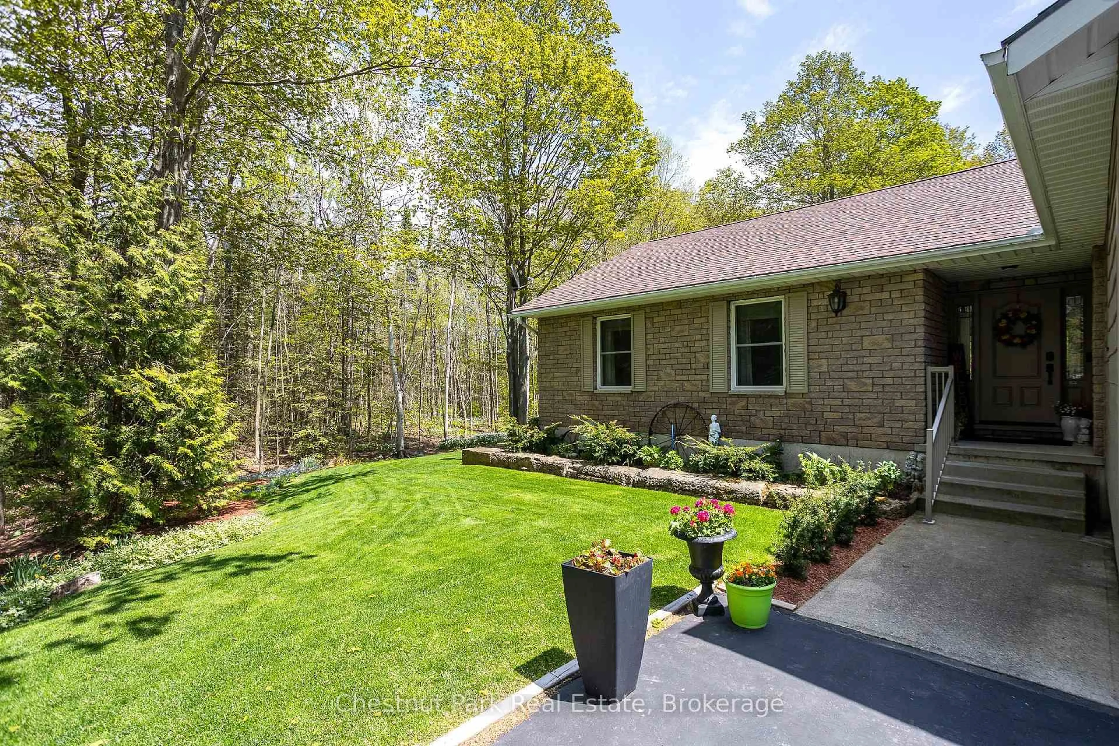 Home with brick exterior material, forest/trees view for 64 Maple Golf Cres, Northern Bruce Peninsula Ontario N0H 2R0