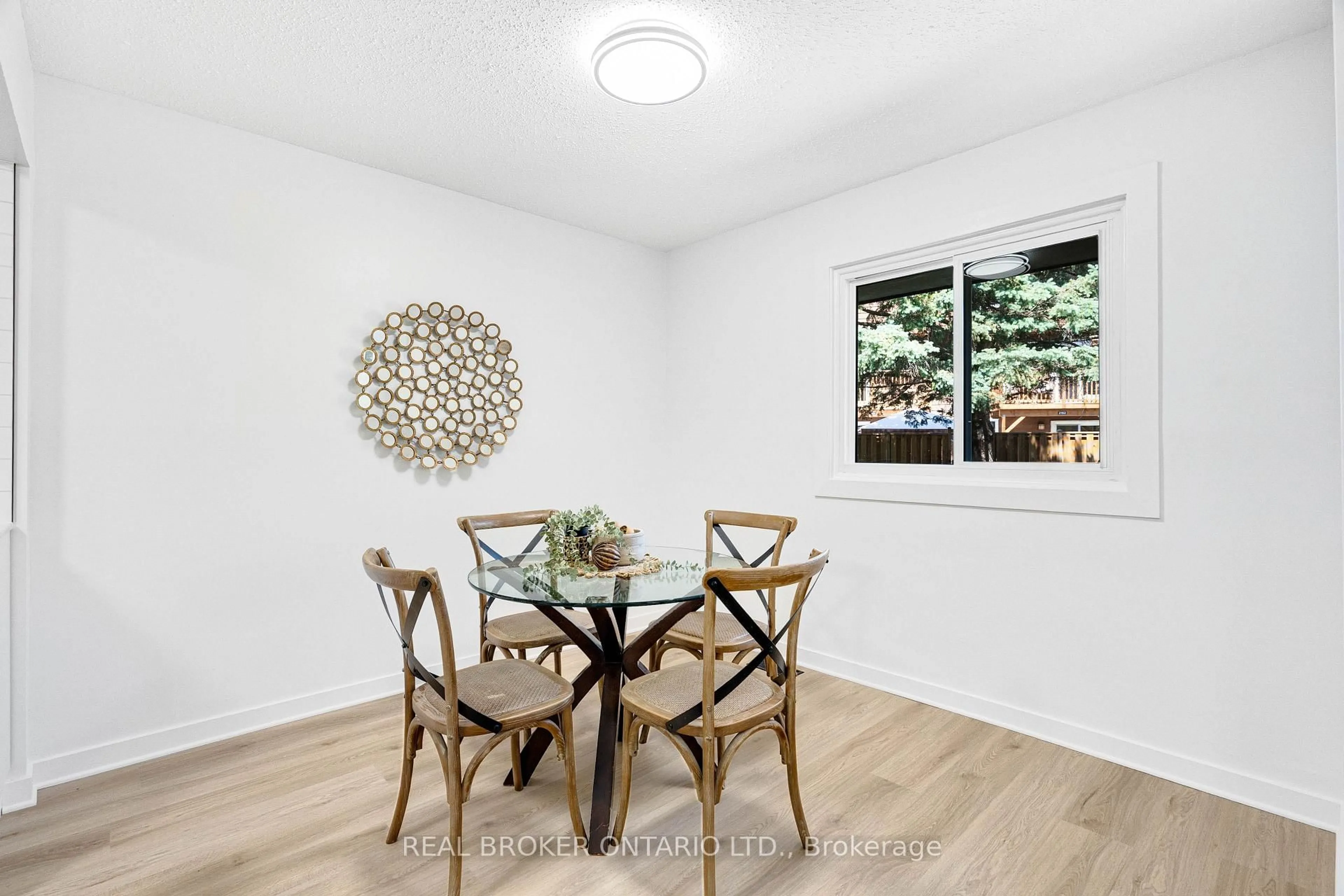 Dining room, wood/laminate floor for 1449 Ridgebrook Dr #124, Ottawa Ontario K1B 4T1