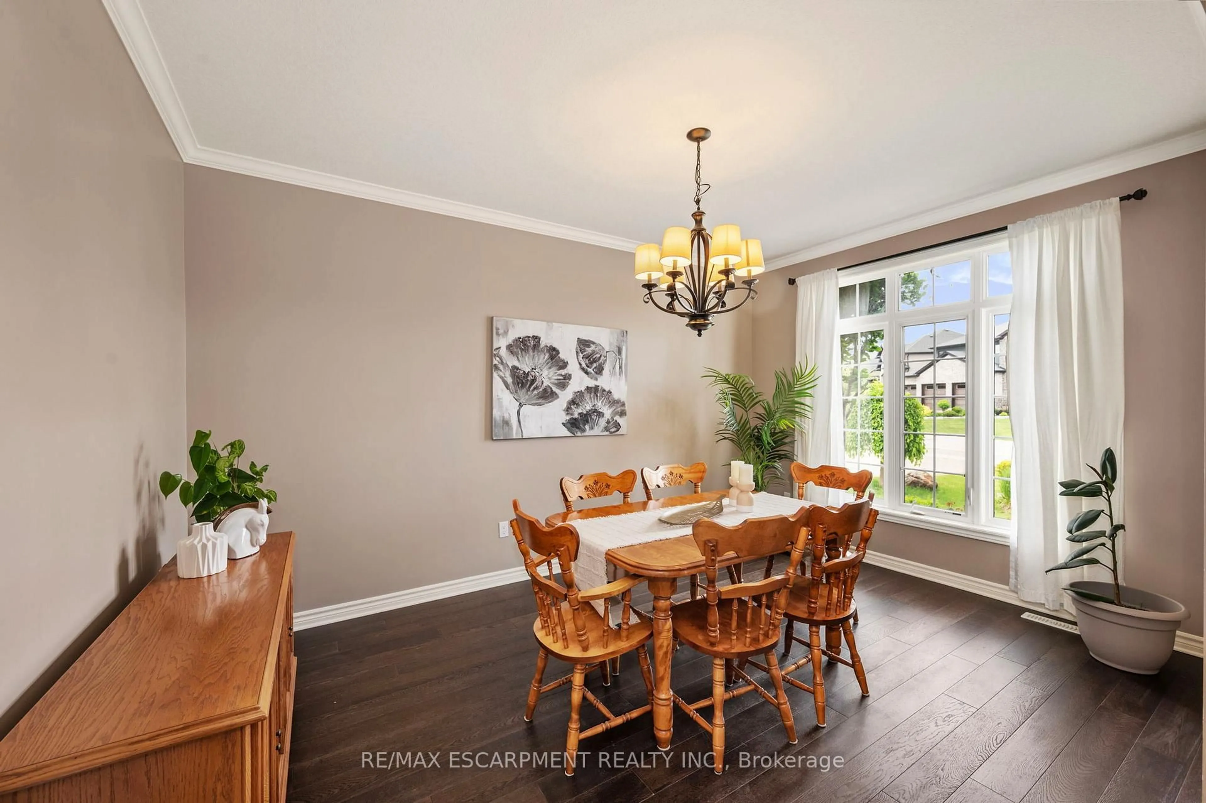 Dining room, wood/laminate floor for 1863 Ballymote Ave, London North Ontario N5X 0J3