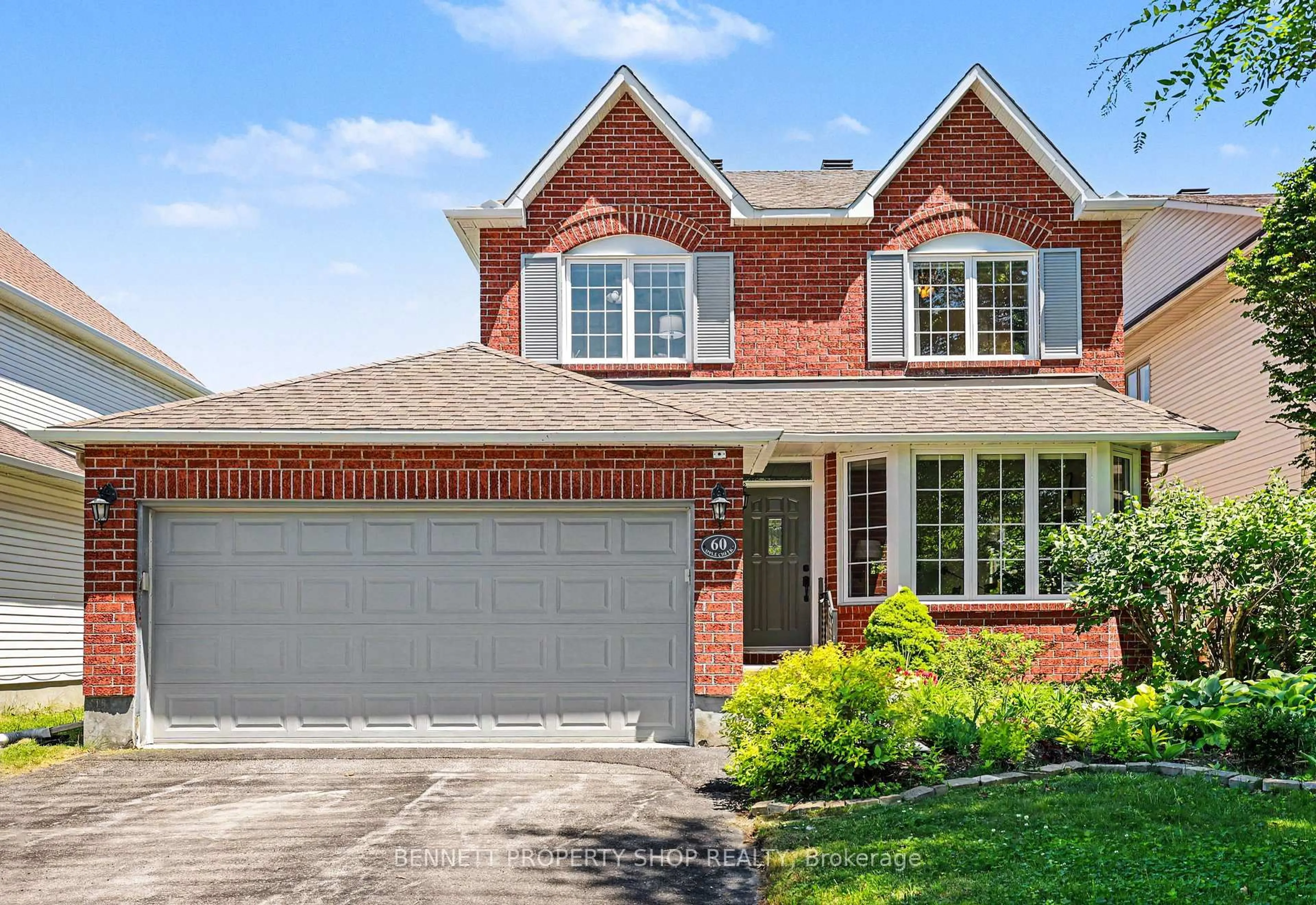 Home with brick exterior material, street for 60 Apple Creek Cres, Ottawa Ontario K2M 2M5