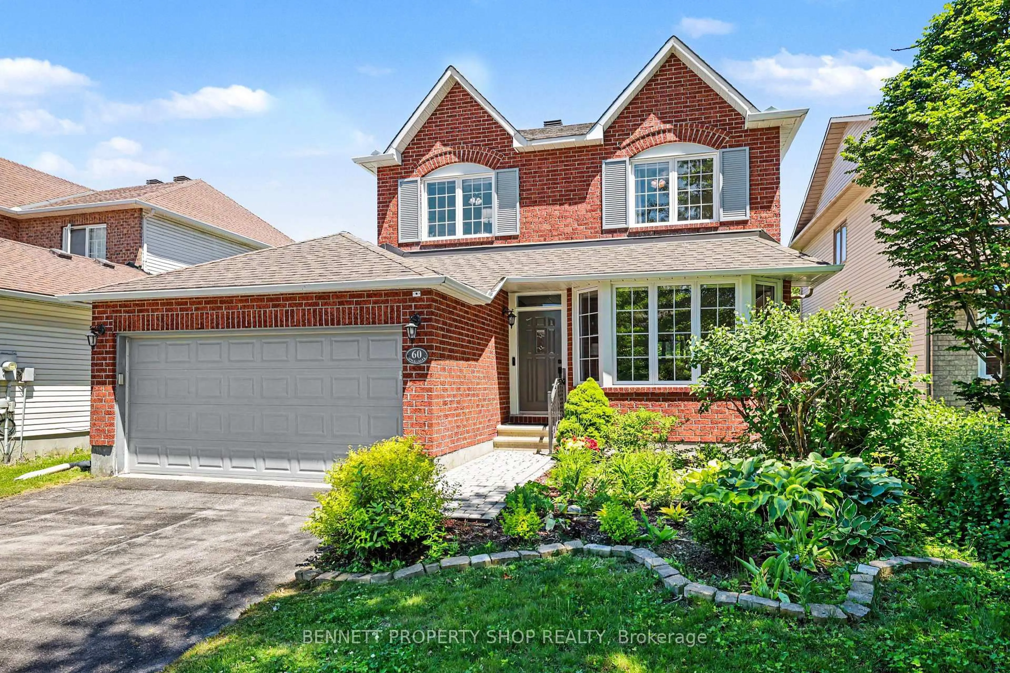 Home with brick exterior material, street for 60 Apple Creek Cres, Ottawa Ontario K2M 2M5