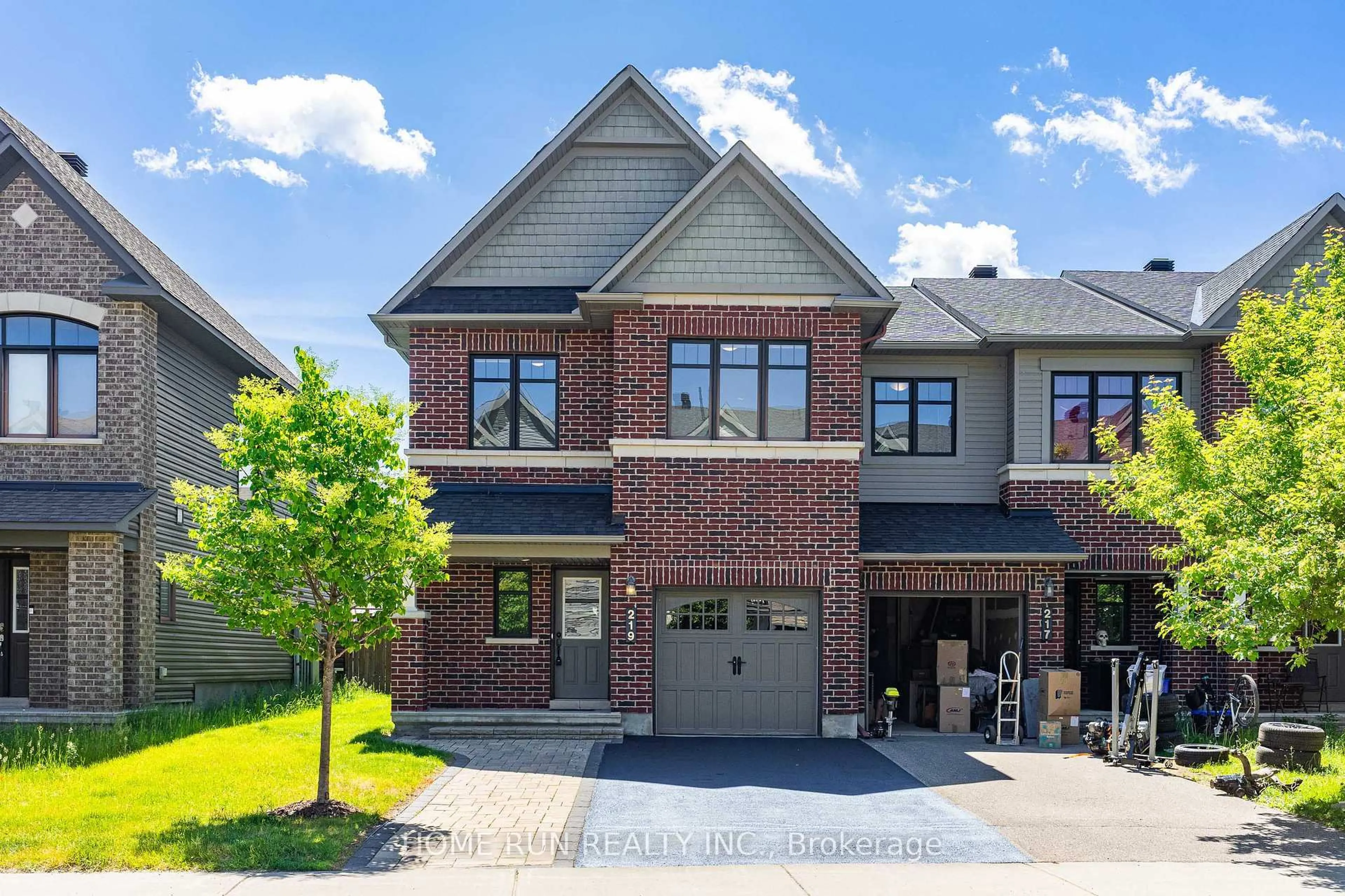 Home with brick exterior material, street for 219 Halyard Way, Ottawa Ontario K2T 0L2