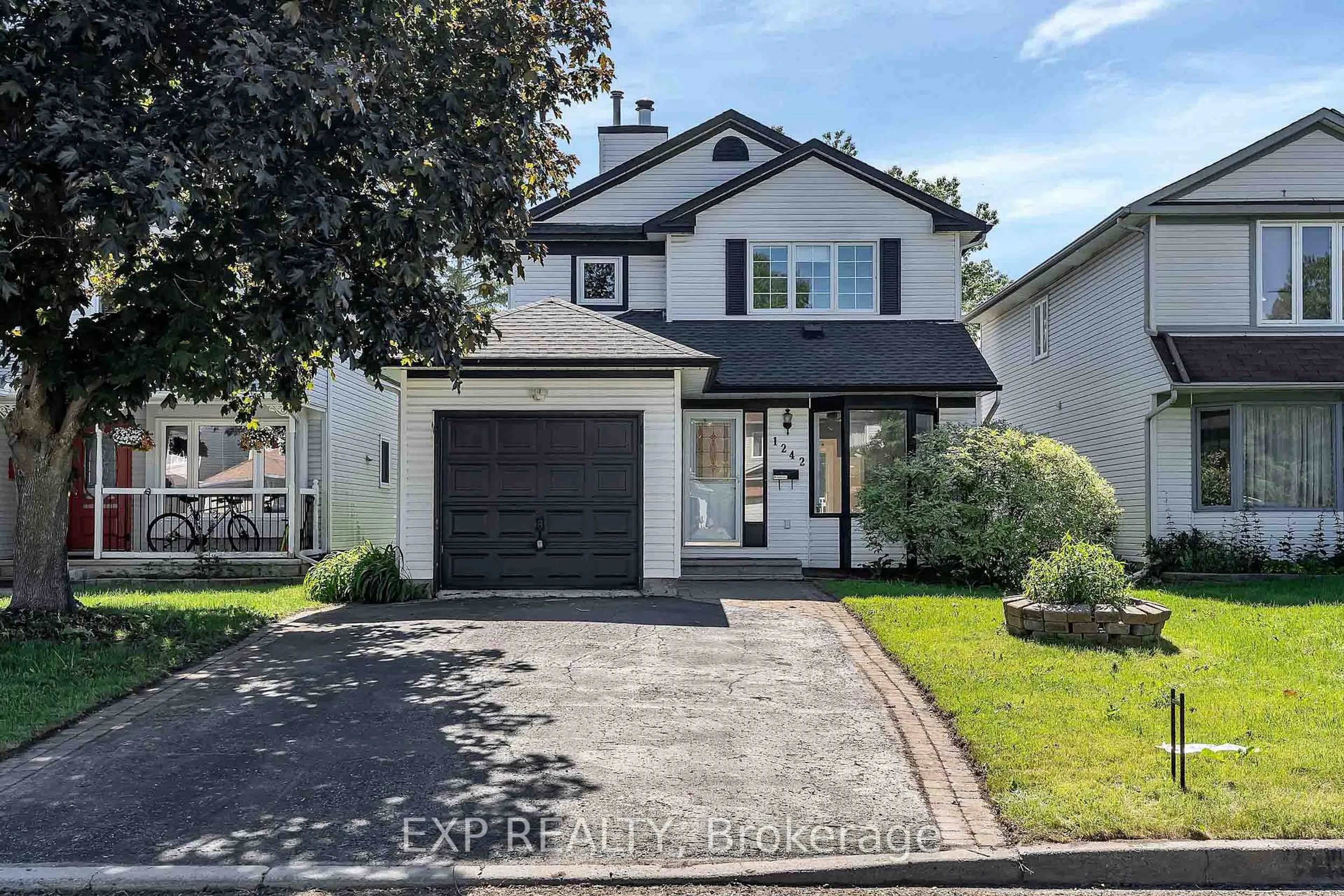 Home with brick exterior material, street for 1242 St Jean St, Orleans Ontario K1C 7C9