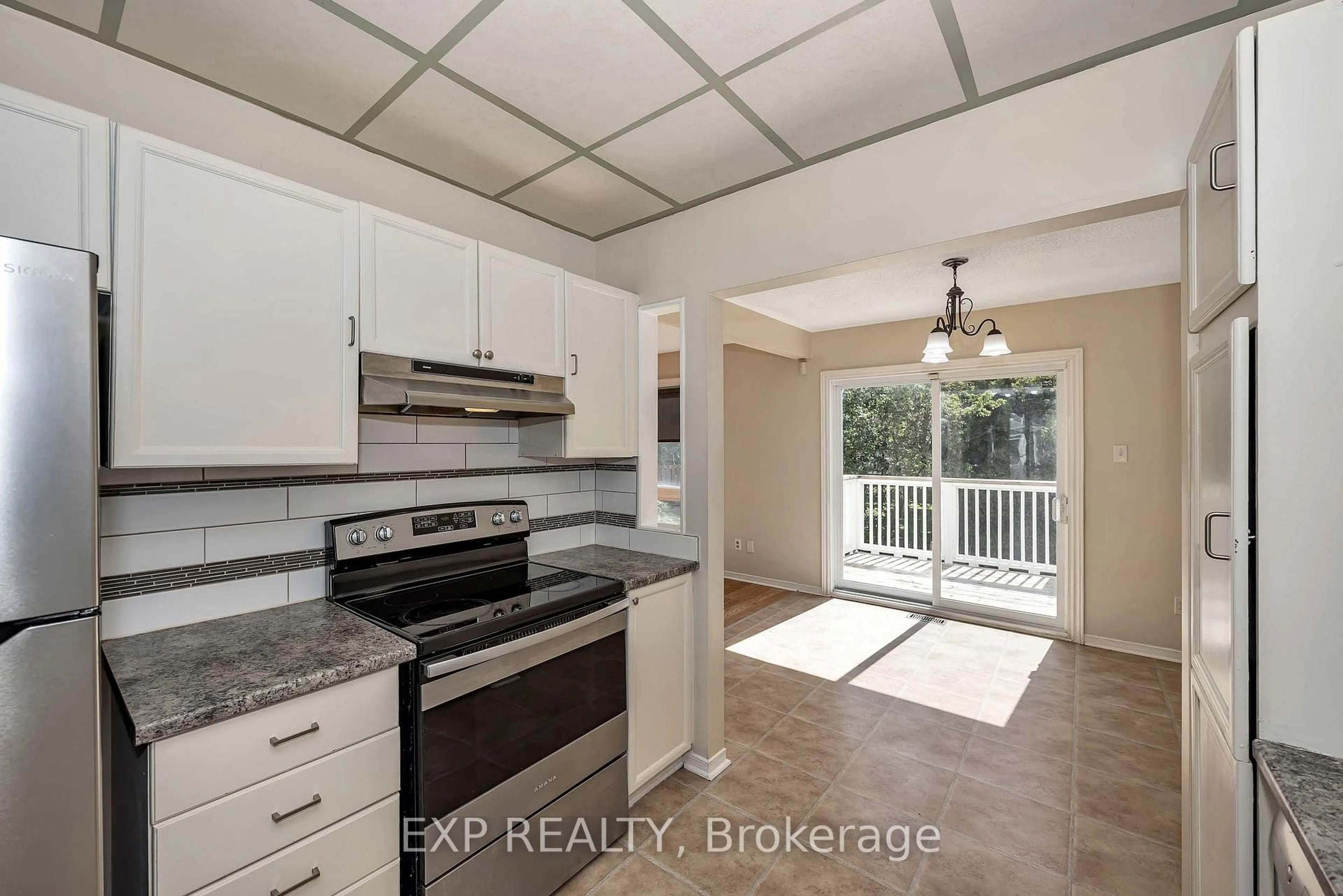 Open concept kitchen, ceramic/tile floor for 1242 St Jean St, Orleans Ontario K1C 7C9
