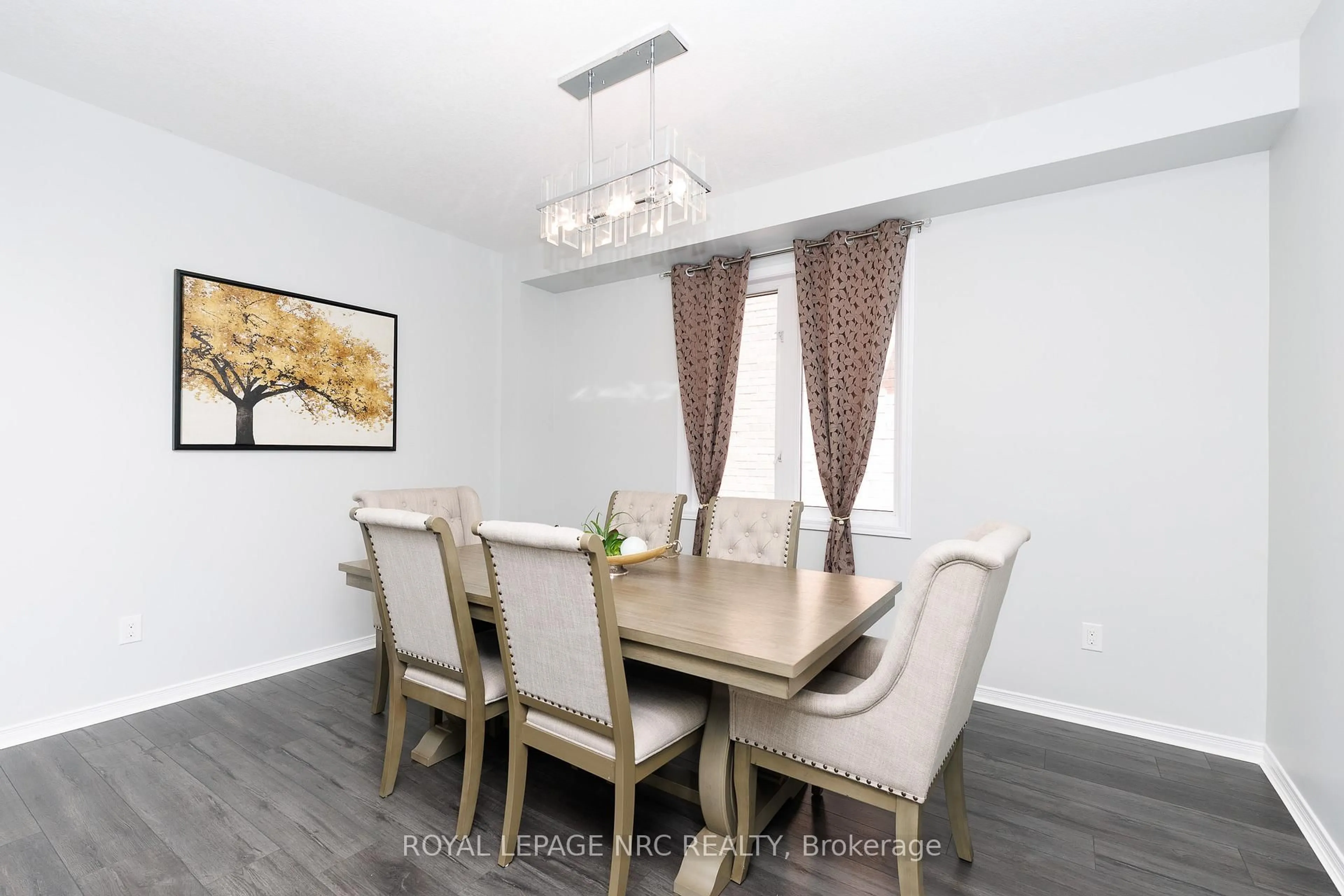 Dining room, wood/laminate floor for 8002 Hackbery Tr, Niagara Falls Ontario L2H 0P1