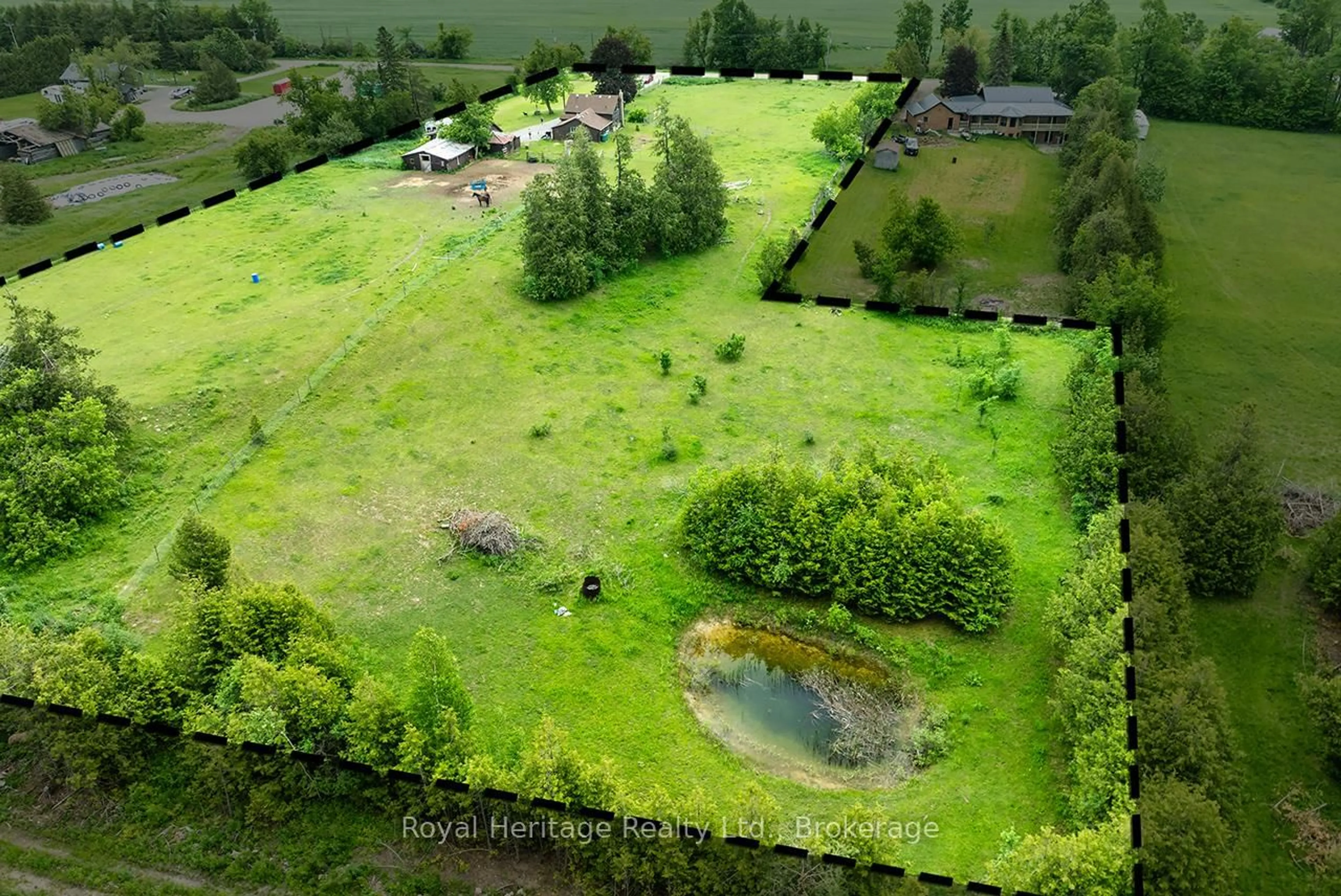 A pic from outside/outdoor area/front of a property/back of a property/a pic from drone, unknown for 303 Four Points Rd, Kawartha Lakes Ontario K0L 1M0
