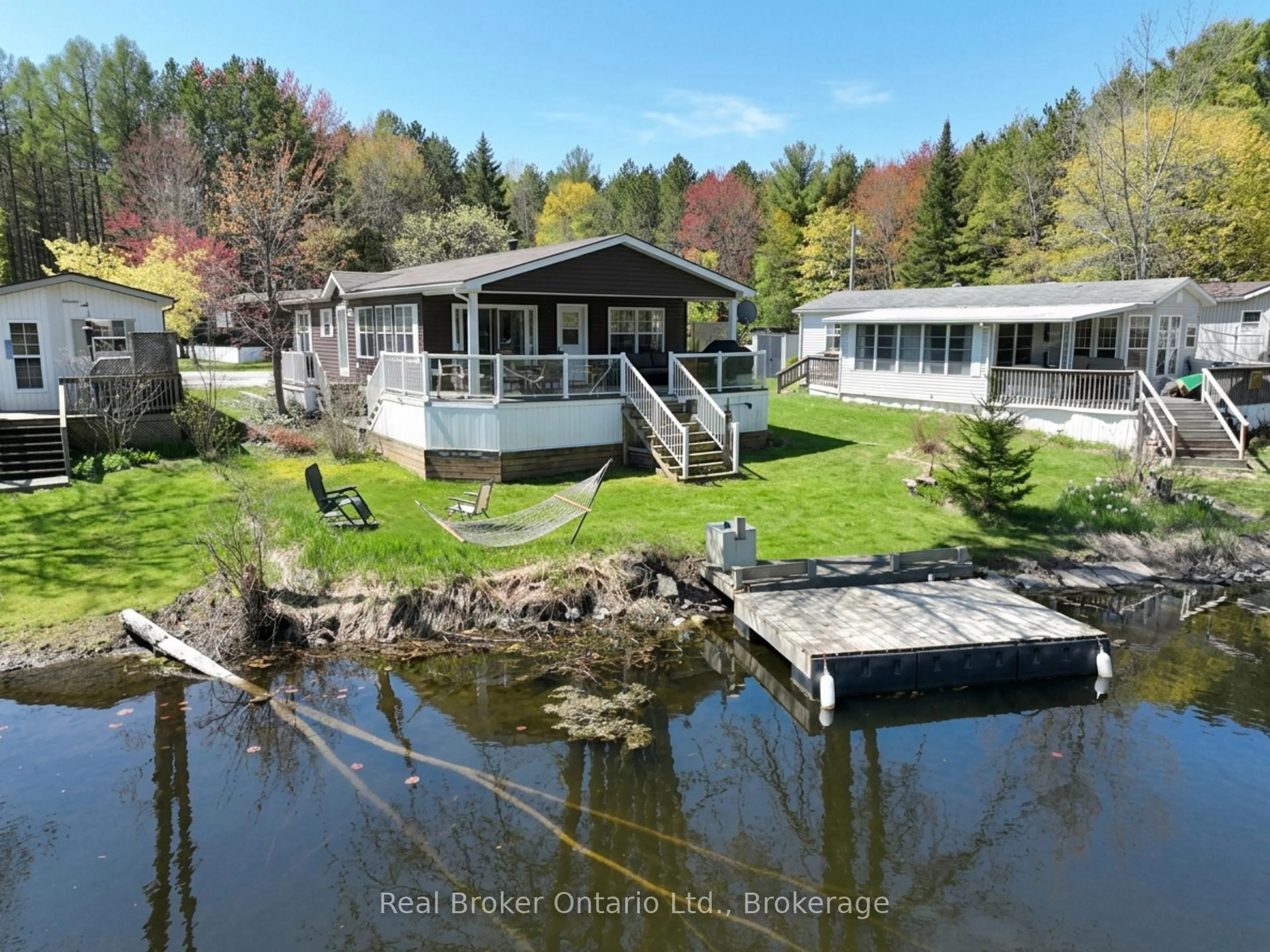 A pic from outside/outdoor area/front of a property/back of a property/a pic from drone, water/lake/river/ocean view for 13 Southline Ave #M24, Huron-Kinloss Ontario N2Z 2X5
