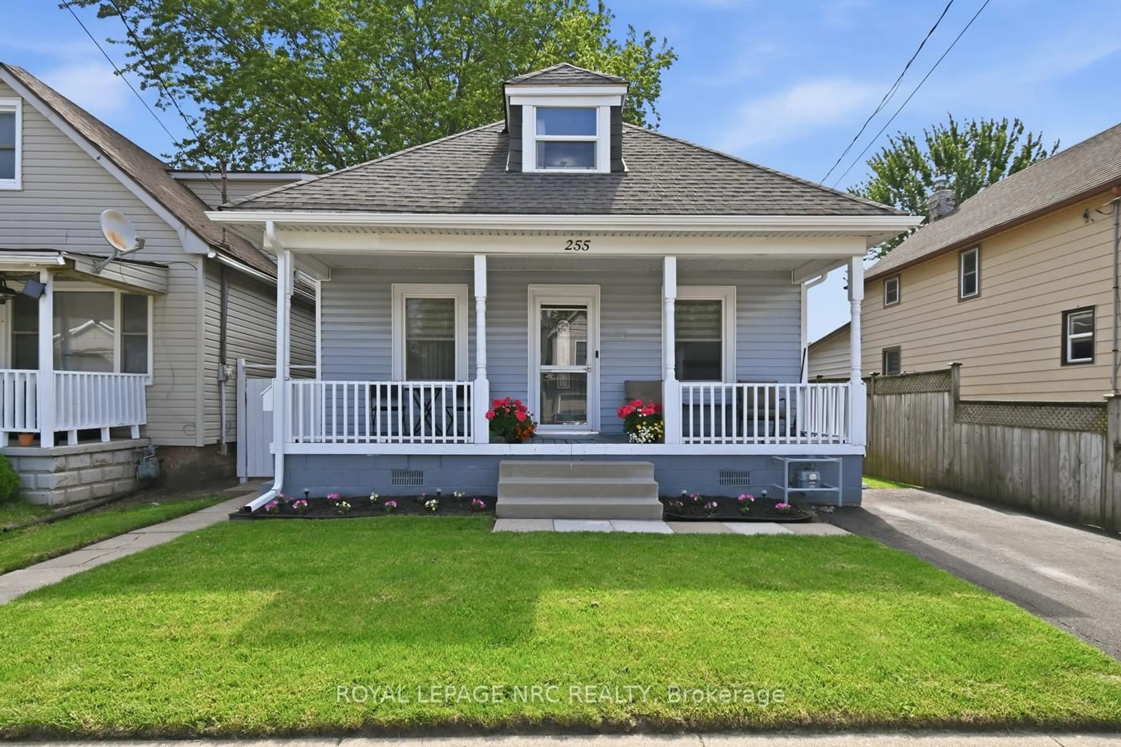 Home with vinyl exterior material, street for 255 Deere St, Welland Ontario L3B 2L9