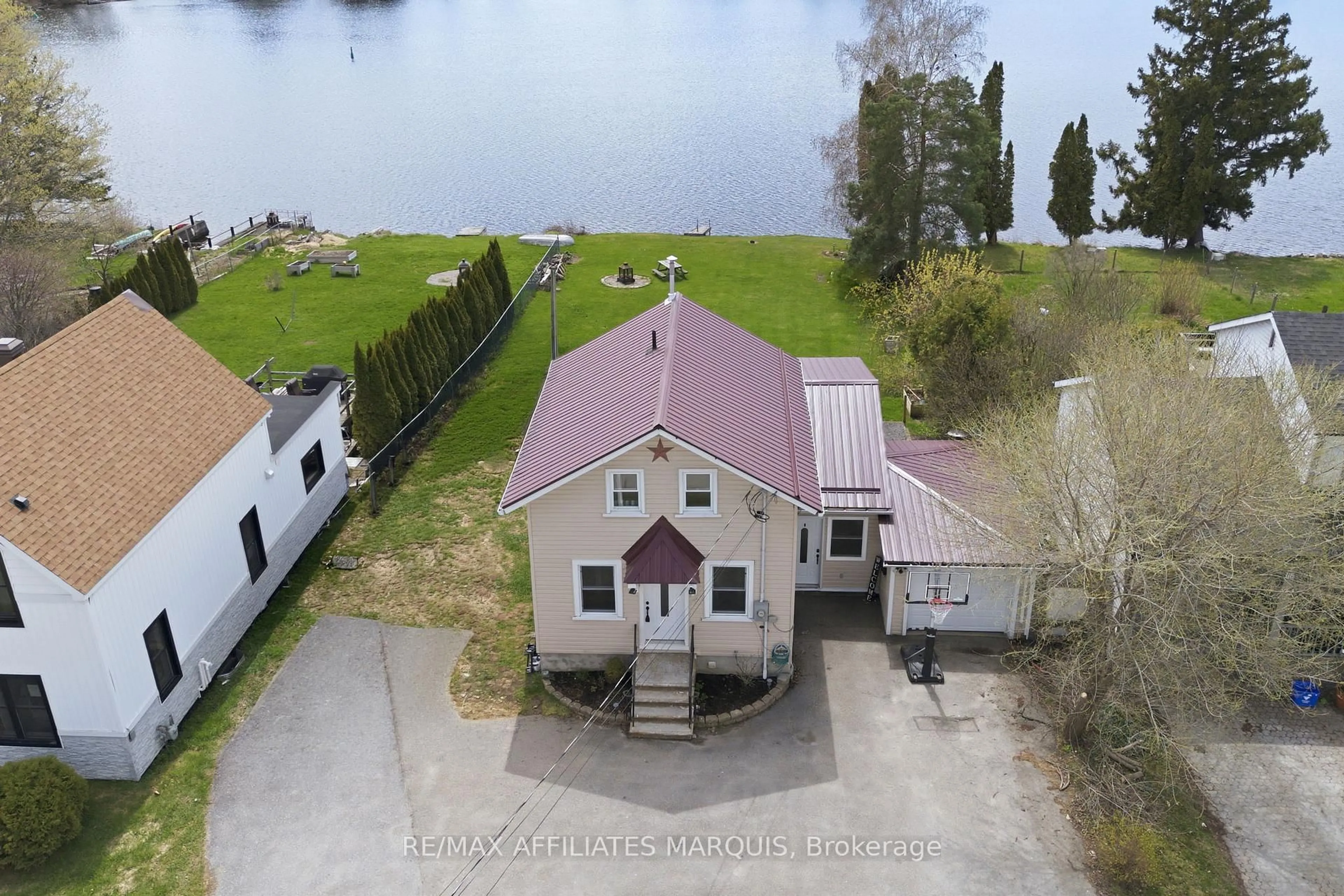 A pic from outside/outdoor area/front of a property/back of a property/a pic from drone, water/lake/river/ocean view for 120 Queen St, Smiths Falls Ontario K7A 3N6