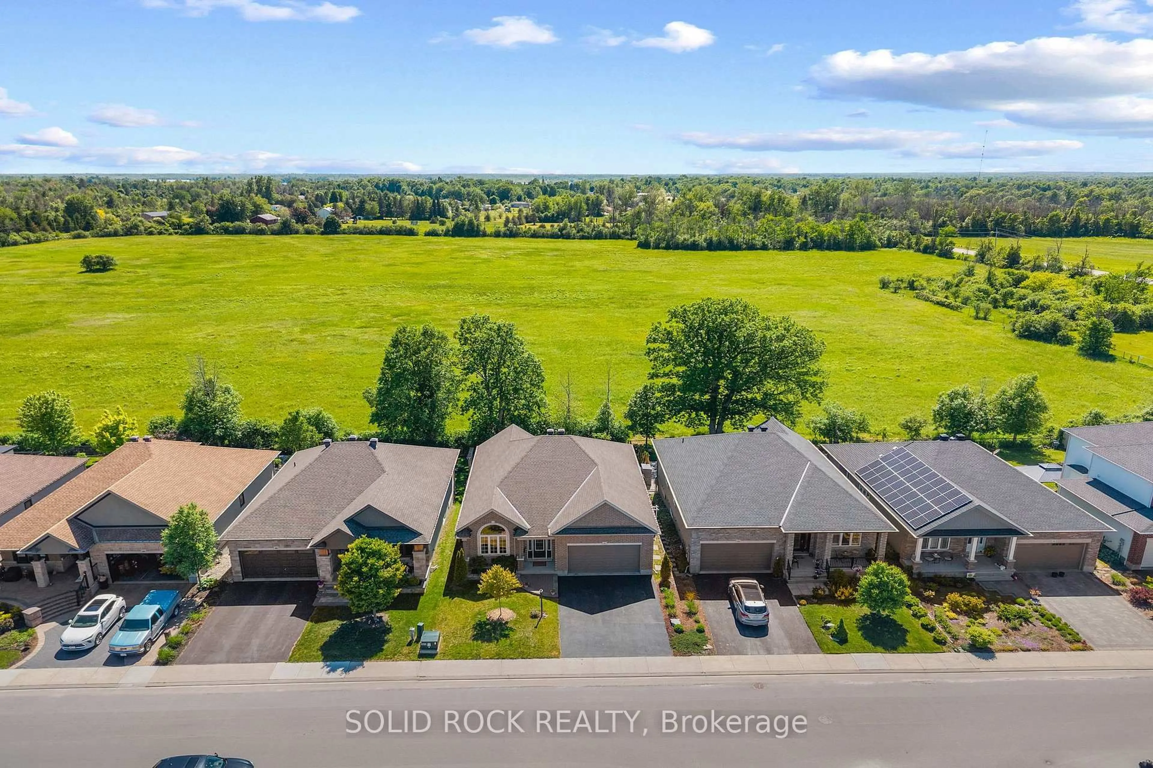 A pic from outside/outdoor area/front of a property/back of a property/a pic from drone, water/lake/river/ocean view for 37 Dulmage Cres, Arnprior Ontario K7S 2G3