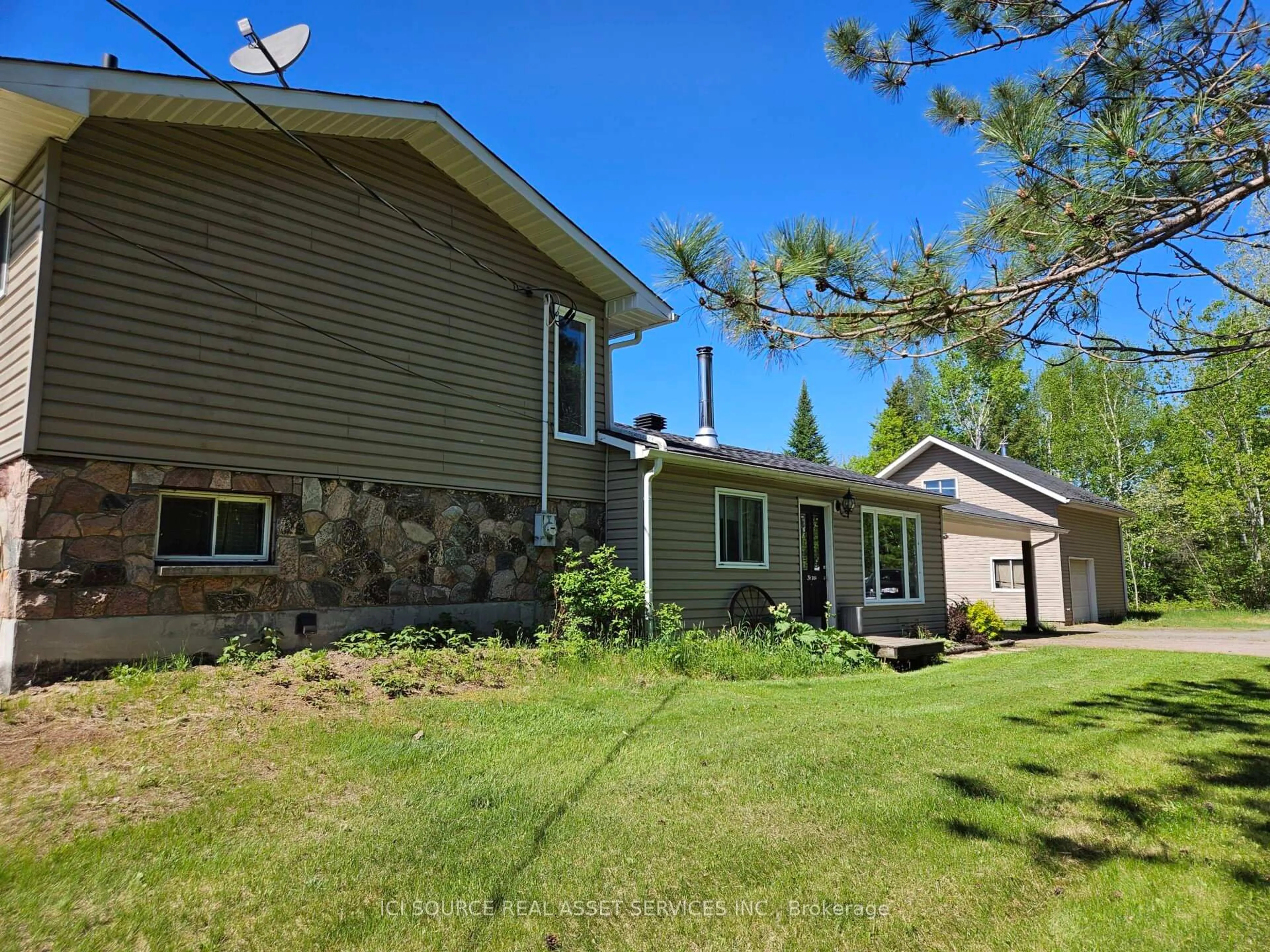 A pic from outside/outdoor area/front of a property/back of a property/a pic from drone, unknown for 1232 Hart Rd, Callander Ontario P0H 1H0