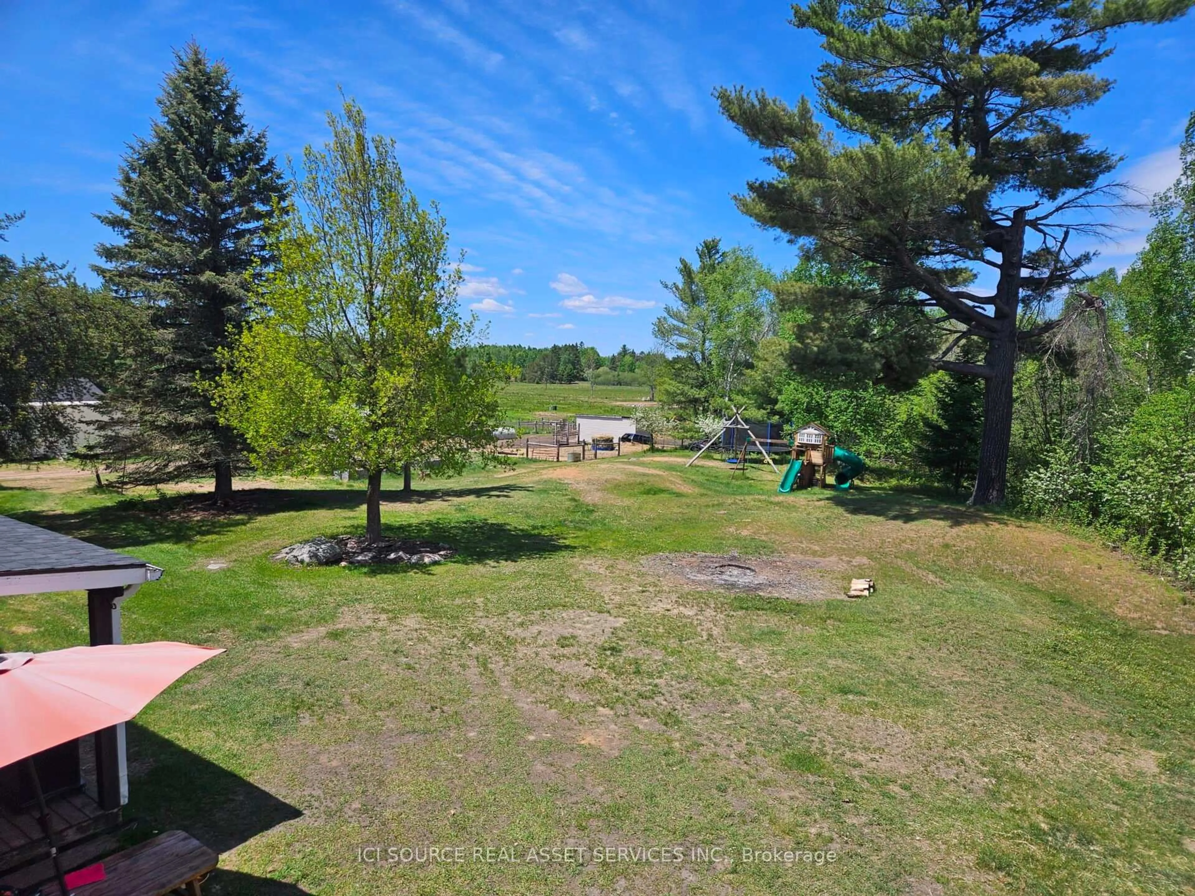 A pic from outside/outdoor area/front of a property/back of a property/a pic from drone, forest/trees view for 1232 Hart Rd, Callander Ontario P0H 1H0