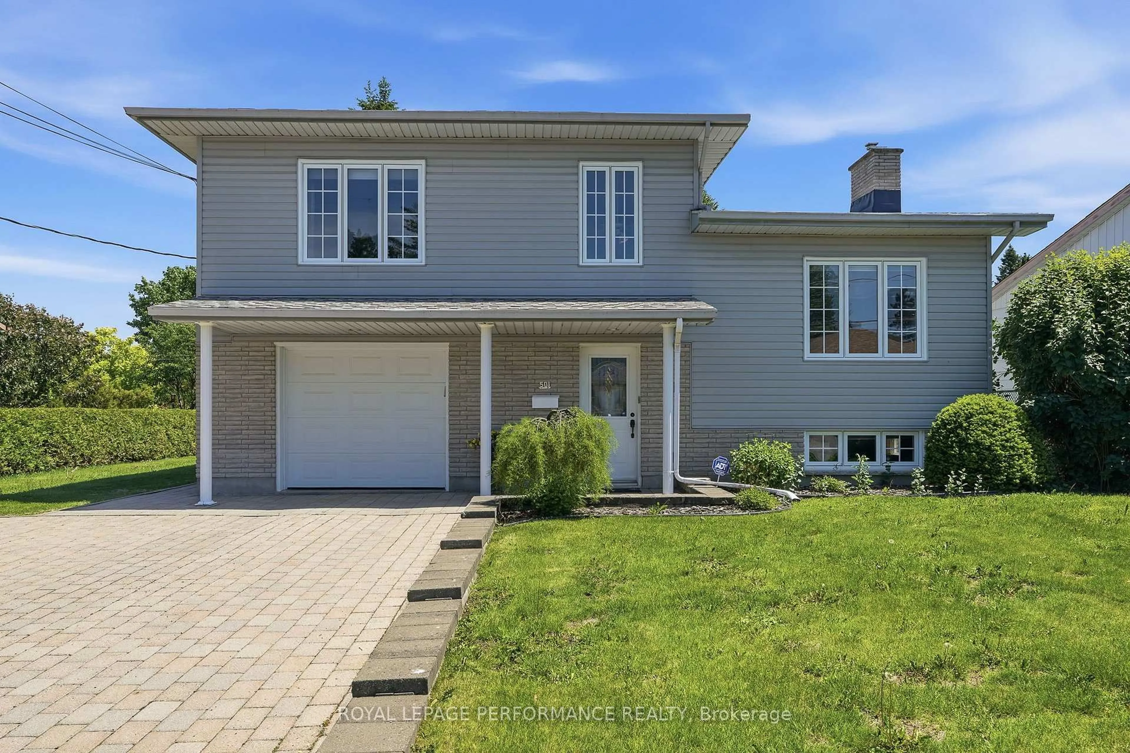 Home with vinyl exterior material, street for 501 Champlain St, Hawkesbury Ontario K6A 2C3