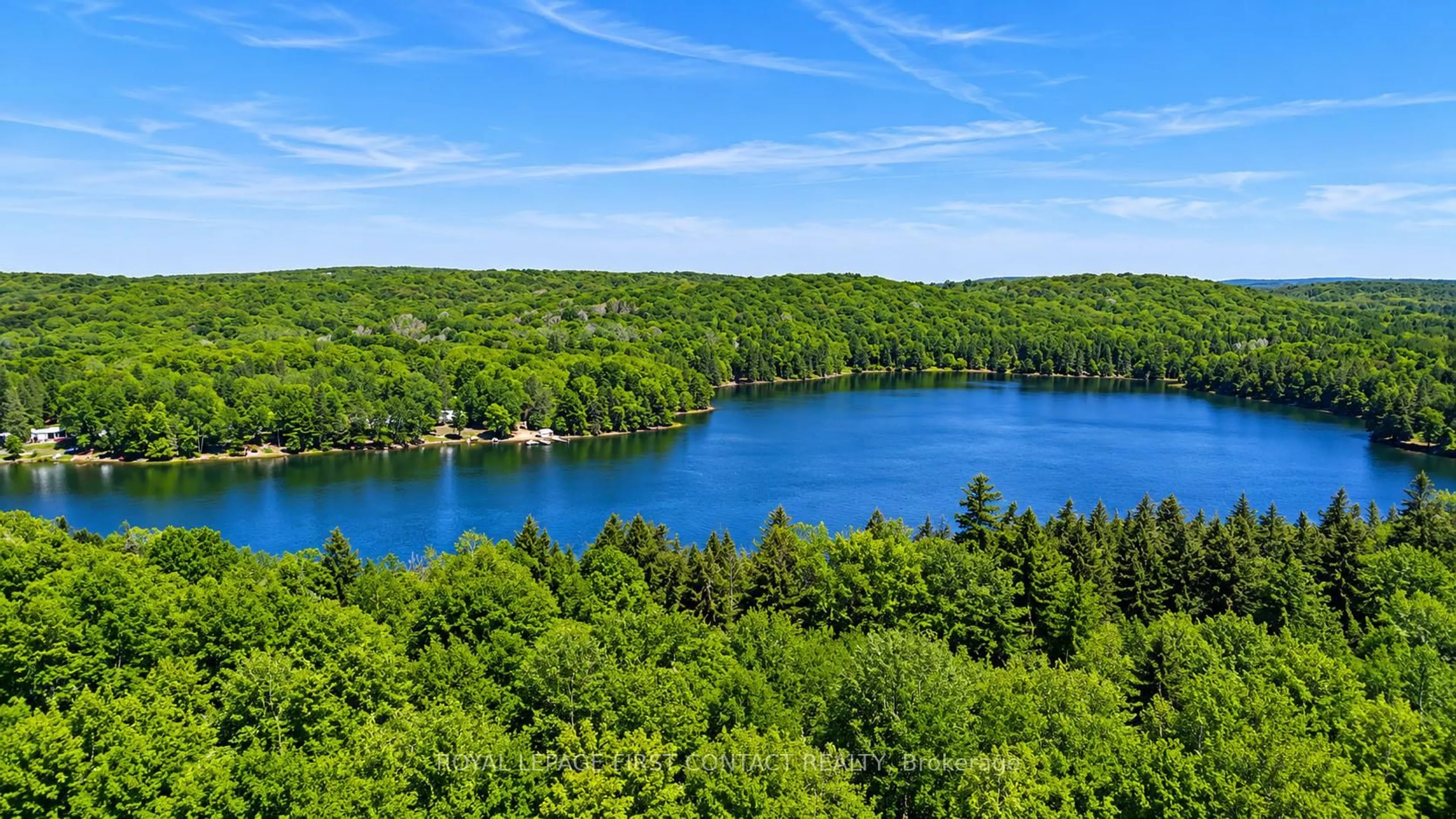 A pic from outside/outdoor area/front of a property/back of a property/a pic from drone, water/lake/river/ocean view for 276 Owl Lake Rd, Armour Ontario P0A 1J0
