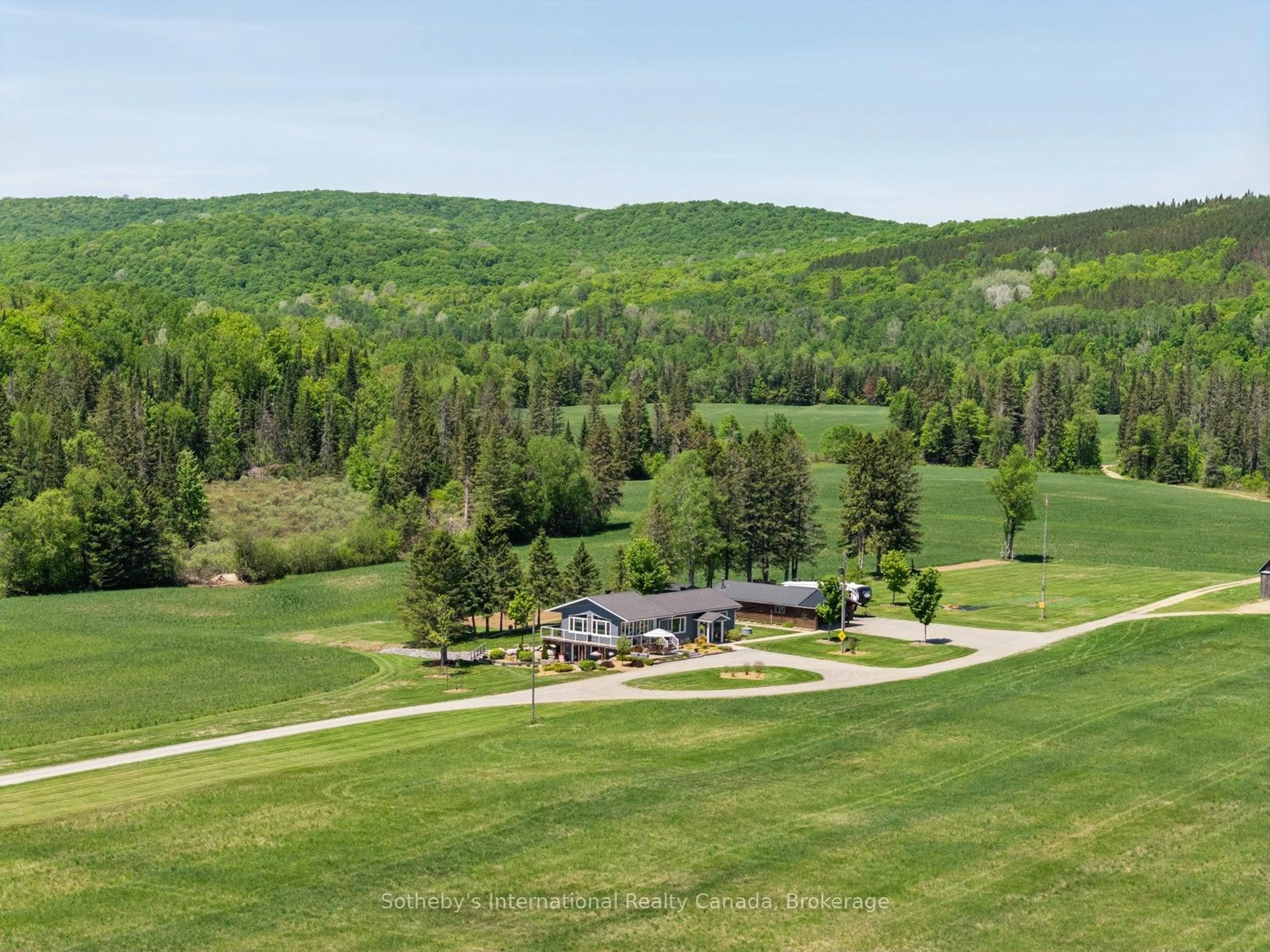 A pic from outside/outdoor area/front of a property/back of a property/a pic from drone, mountain view for 362 McGarry Rd, Maynooth Ontario K0L 2S0