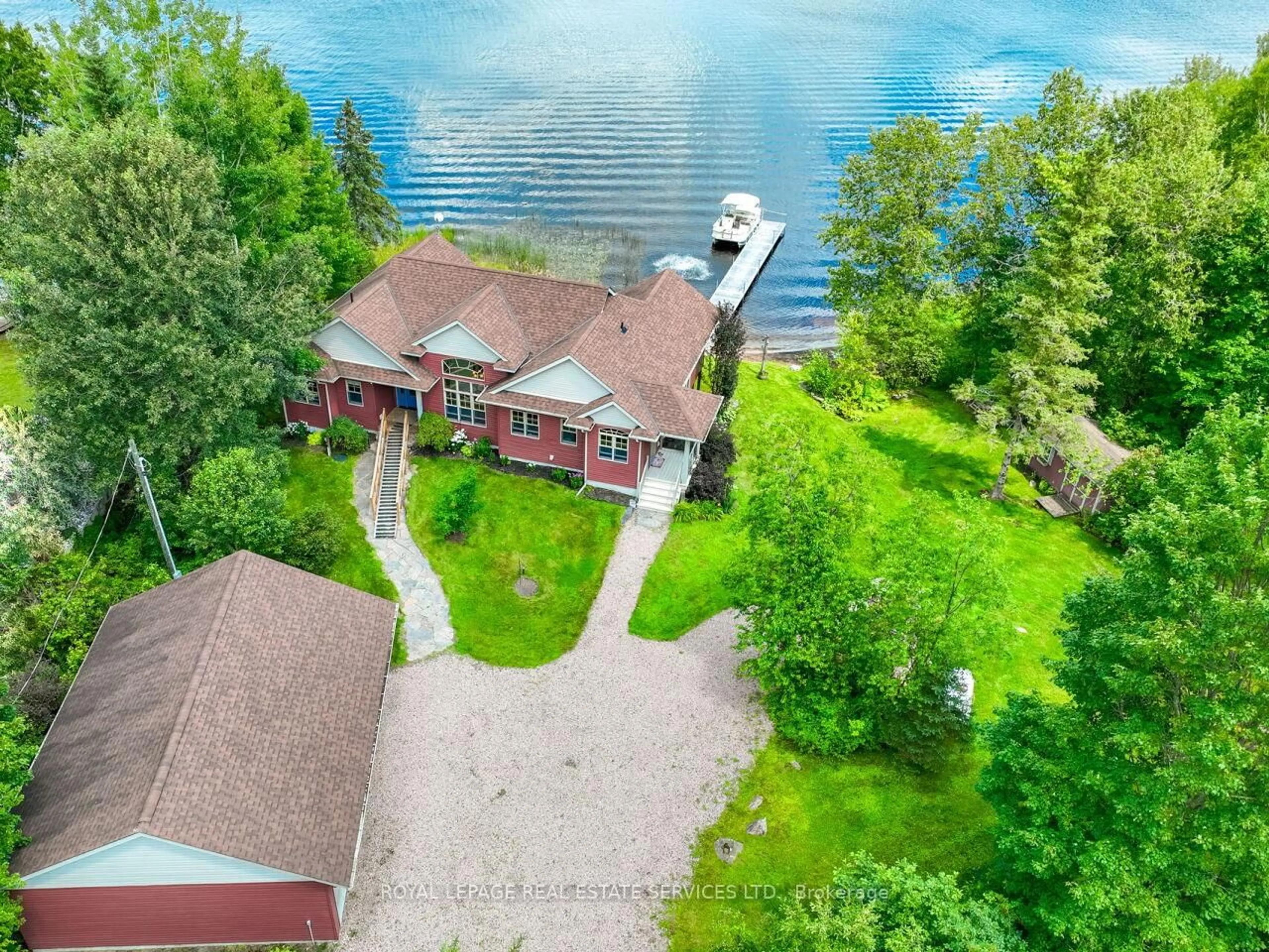 A pic from outside/outdoor area/front of a property/back of a property/a pic from drone, water/lake/river/ocean view for 114 Islandview Lane, Chisholm Ontario P0H 1Z0