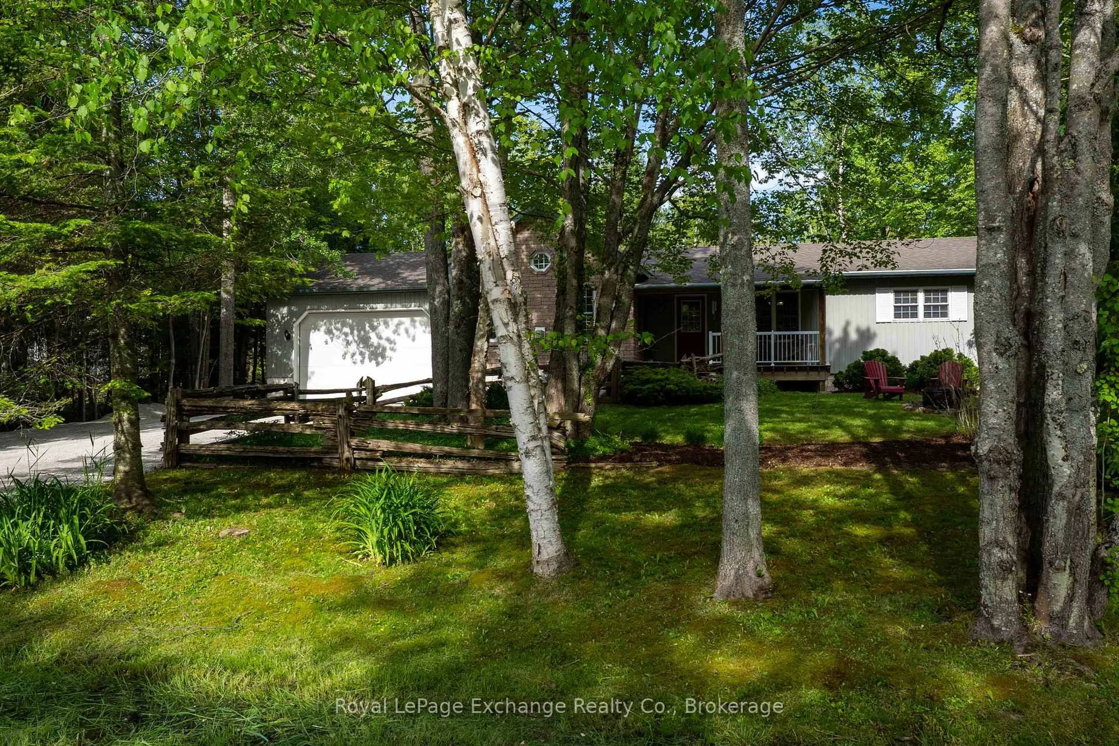 A pic from outside/outdoor area/front of a property/back of a property/a pic from drone, forest/trees view for 719 York Ave, South Bruce Peninsula Ontario N0H 2G0