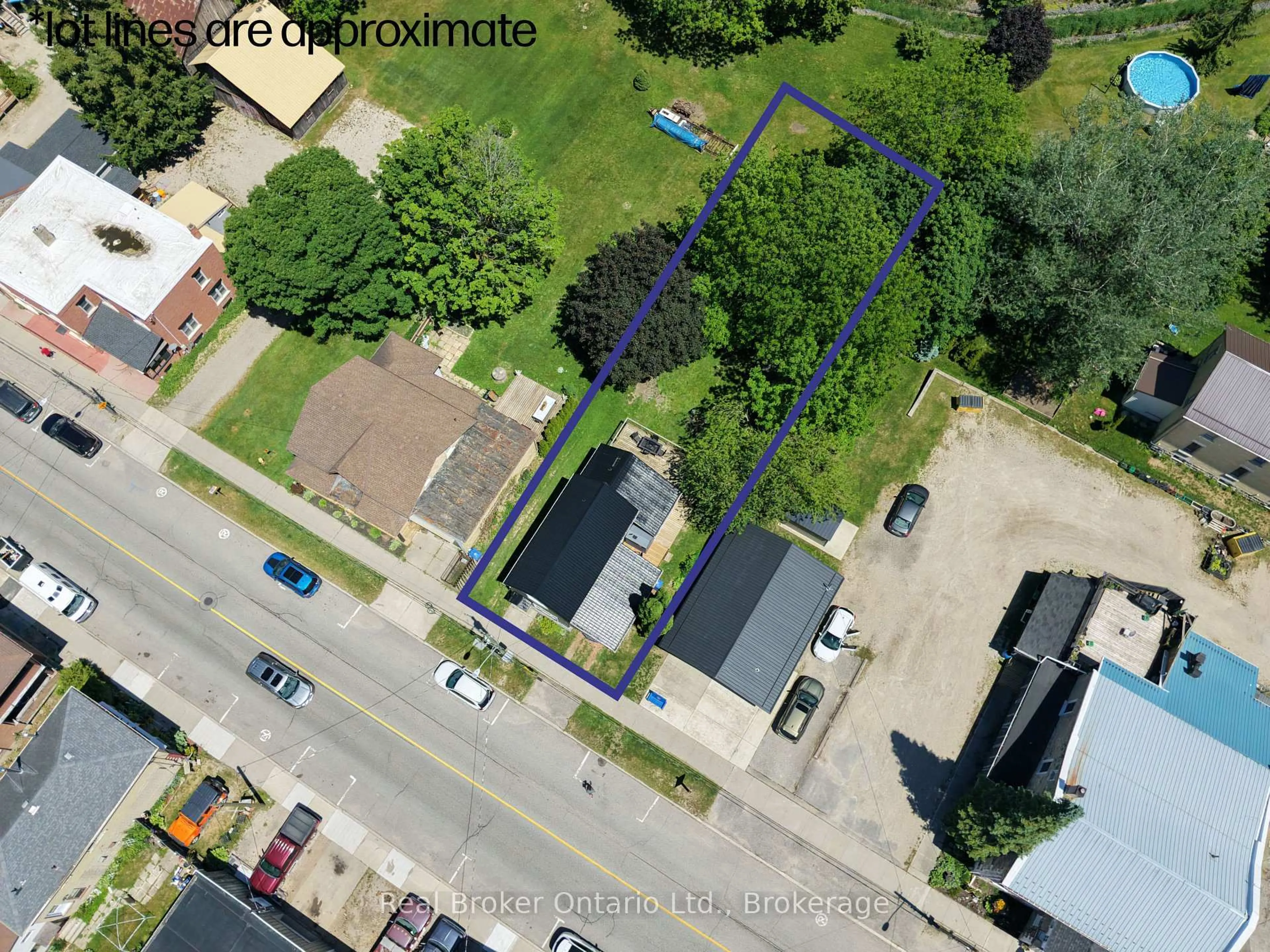 A pic from outside/outdoor area/front of a property/back of a property/a pic from drone, street for 523 Mill St, West Grey Ontario N0G 2M0