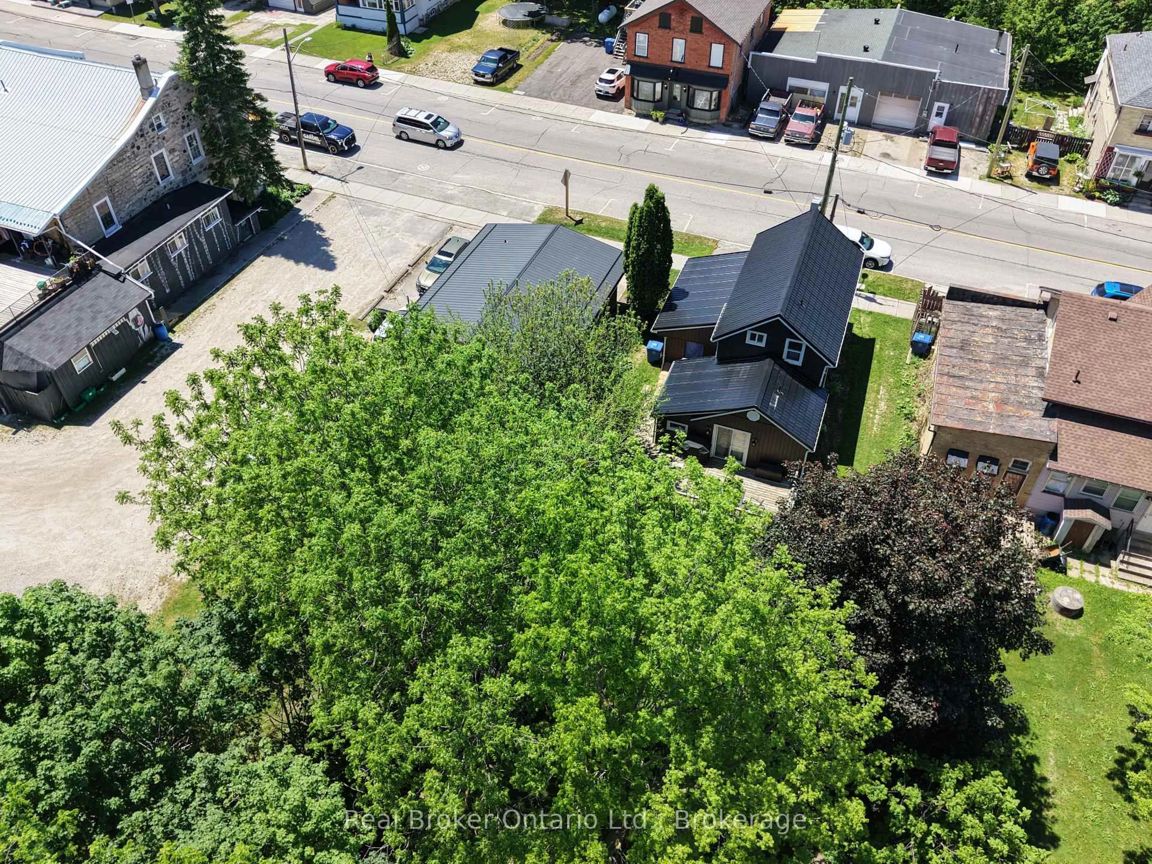 A pic from outside/outdoor area/front of a property/back of a property/a pic from drone, street for 523 Mill St, West Grey Ontario N0G 2M0