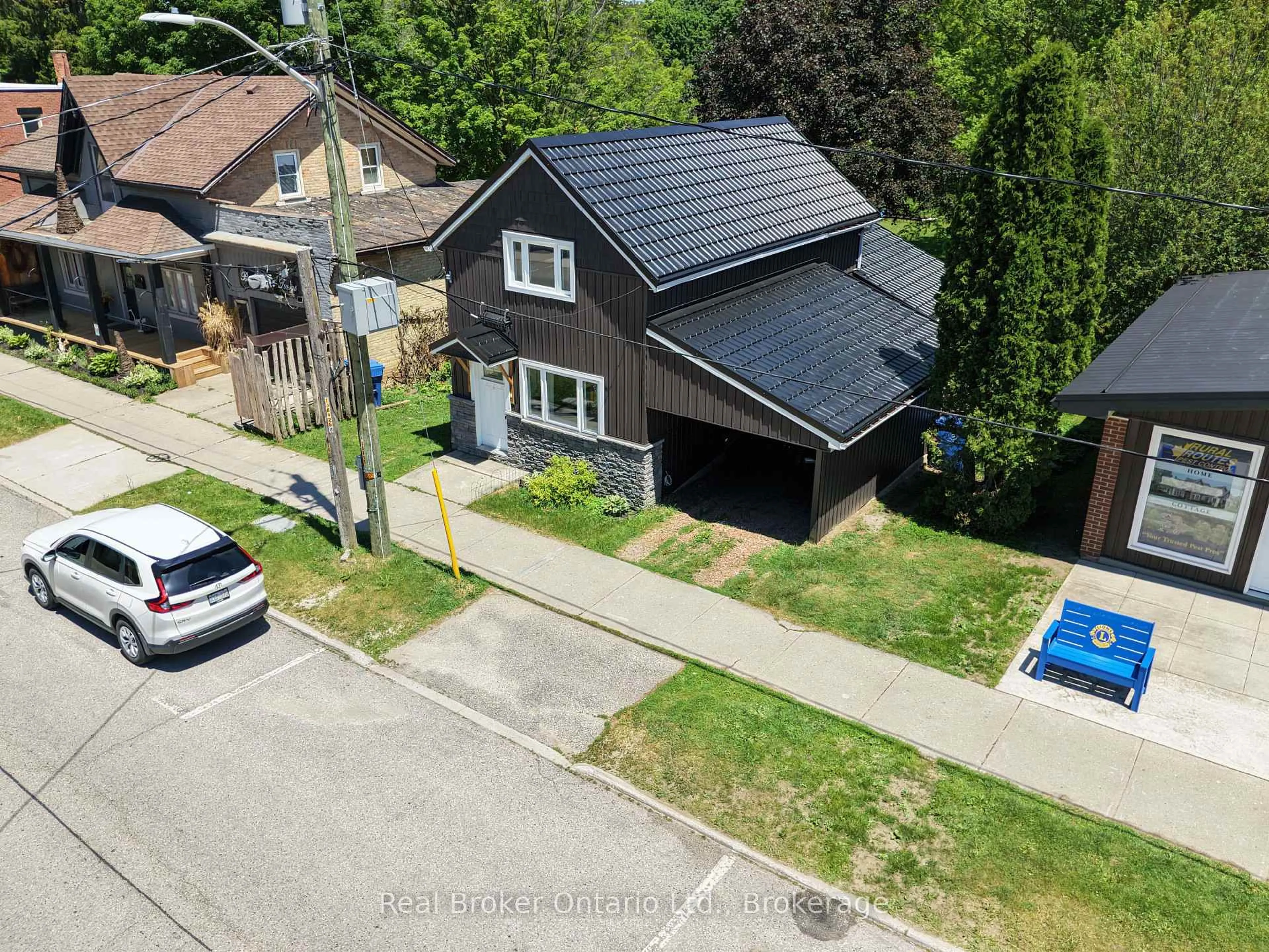 A pic from outside/outdoor area/front of a property/back of a property/a pic from drone, street for 523 Mill St, West Grey Ontario N0G 2M0