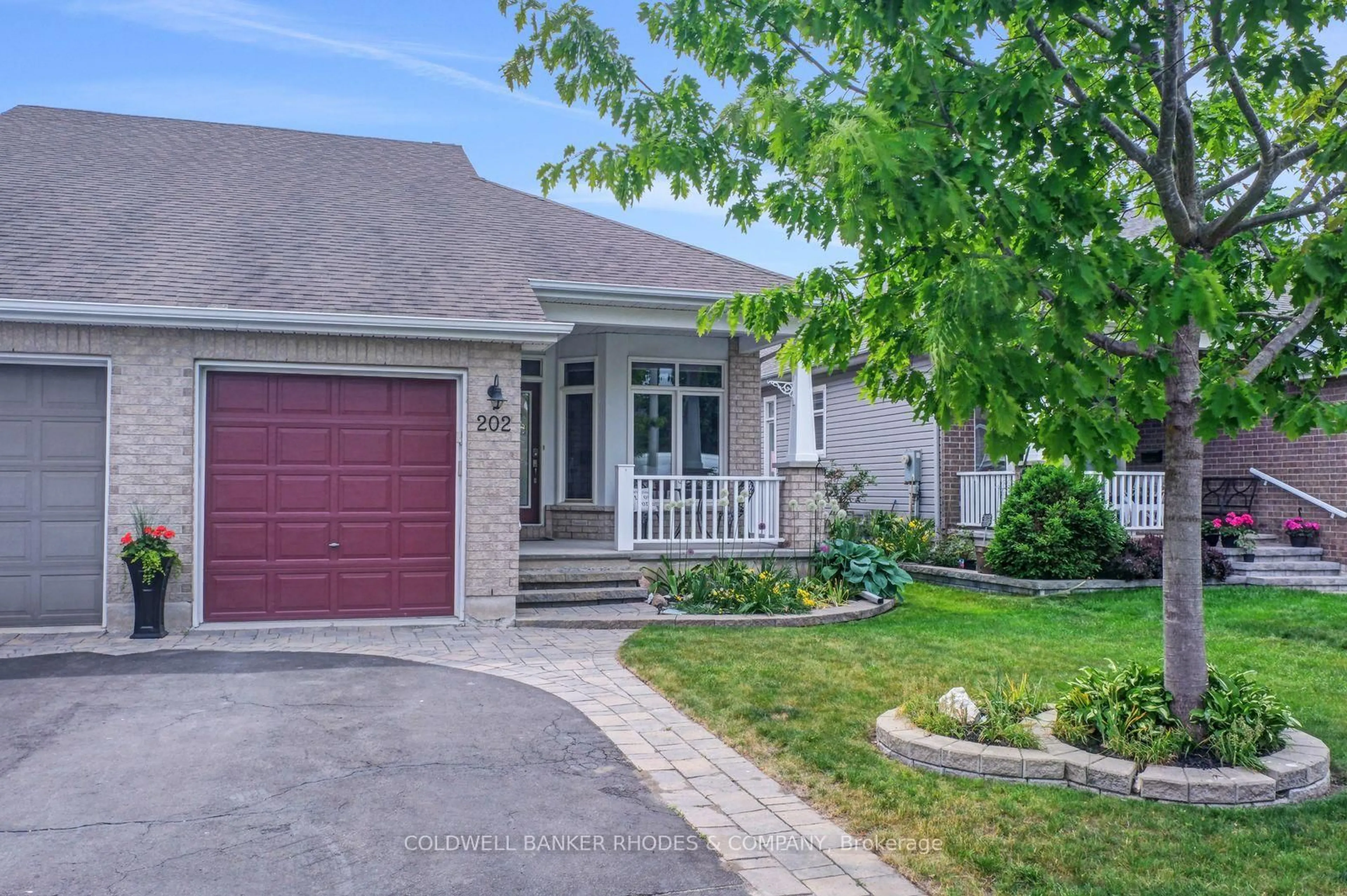 Home with brick exterior material, street for 202 Bulrush Cres, Ottawa Ontario K1T 0E5