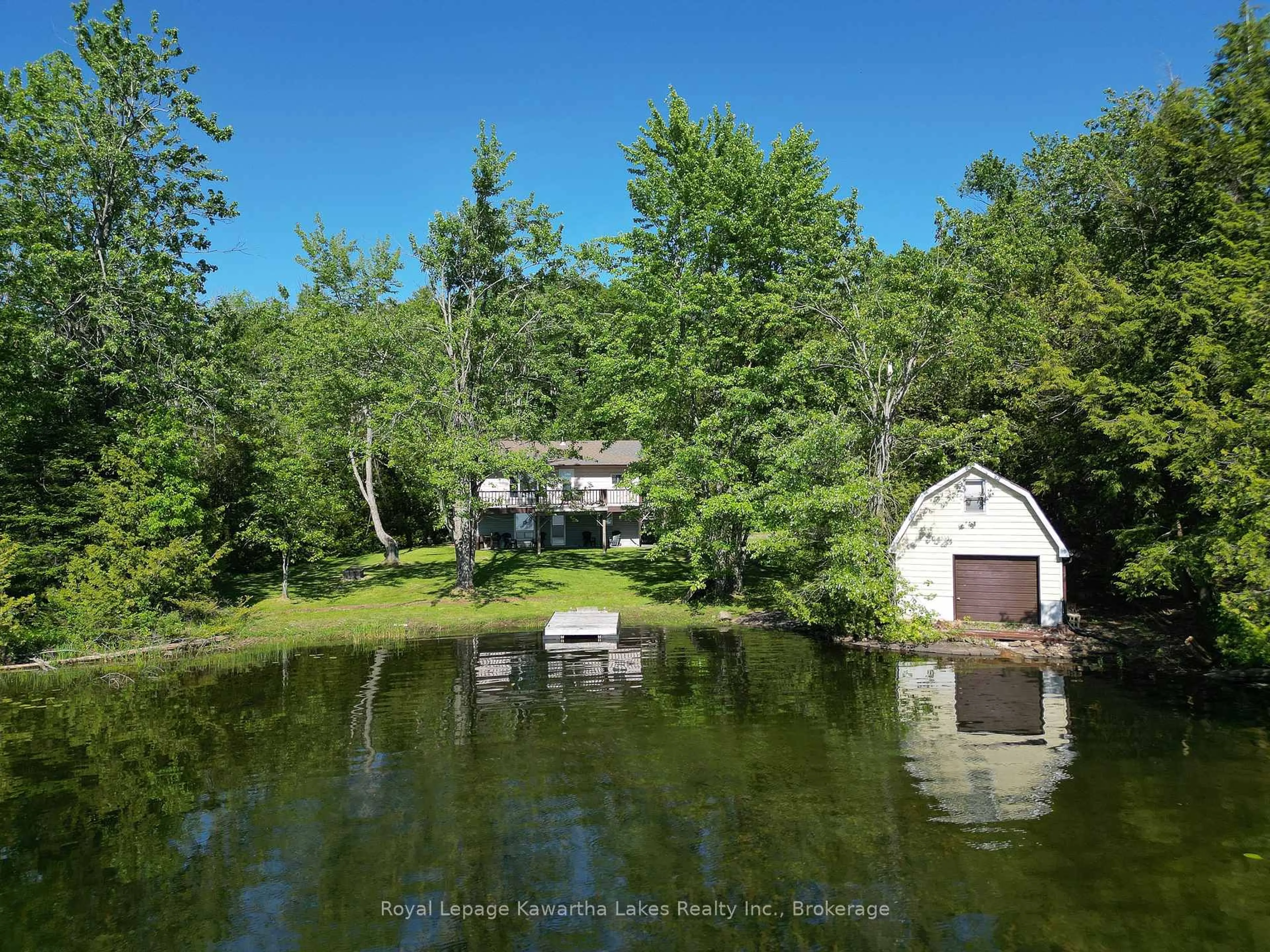 A pic from outside/outdoor area/front of a property/back of a property/a pic from drone, water/lake/river/ocean view for 40 Wembley Dr, Kawartha Lakes Ontario K0M 1N0