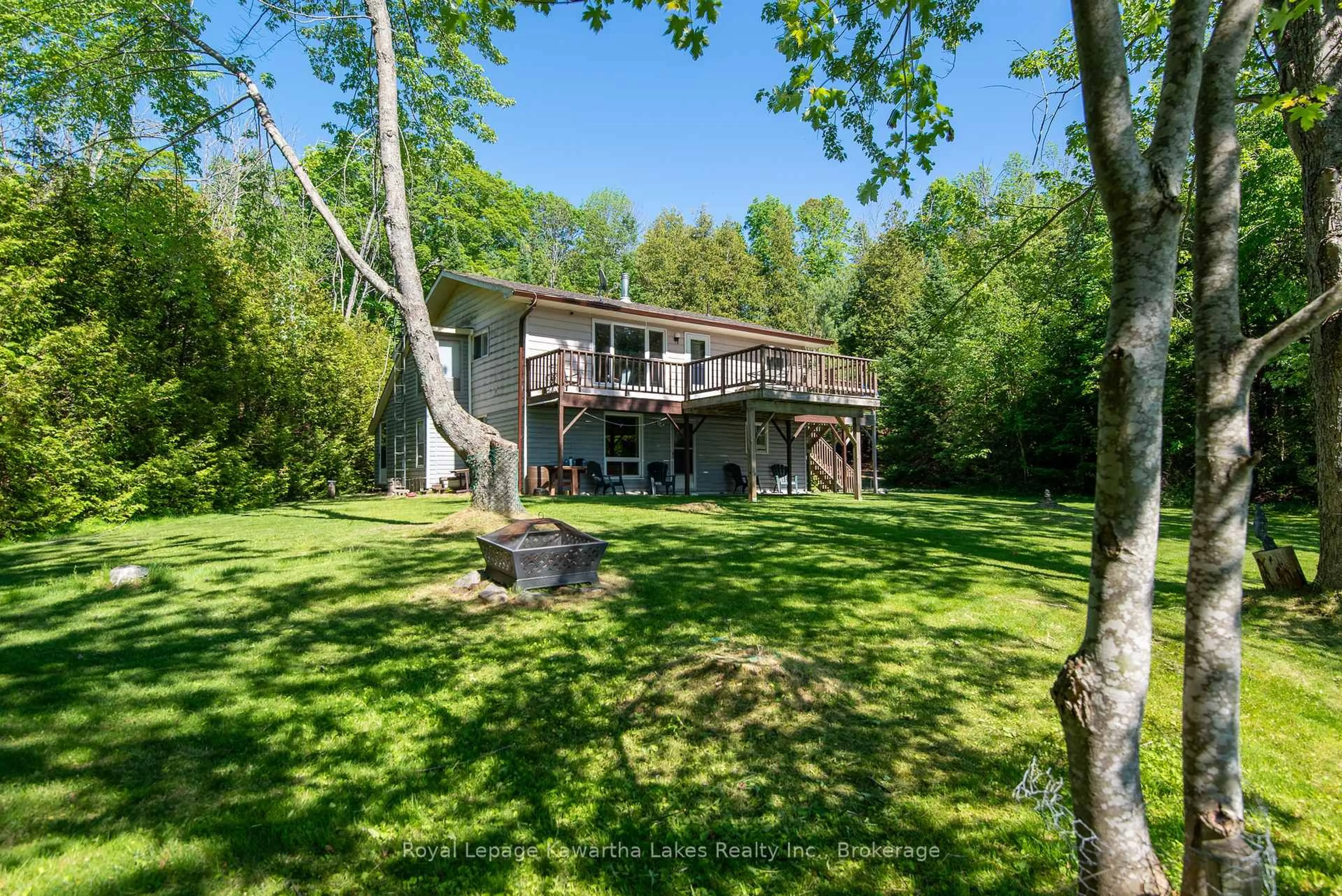 A pic from outside/outdoor area/front of a property/back of a property/a pic from drone, water/lake/river/ocean view for 40 Wembley Dr, Kawartha Lakes Ontario K0M 1N0