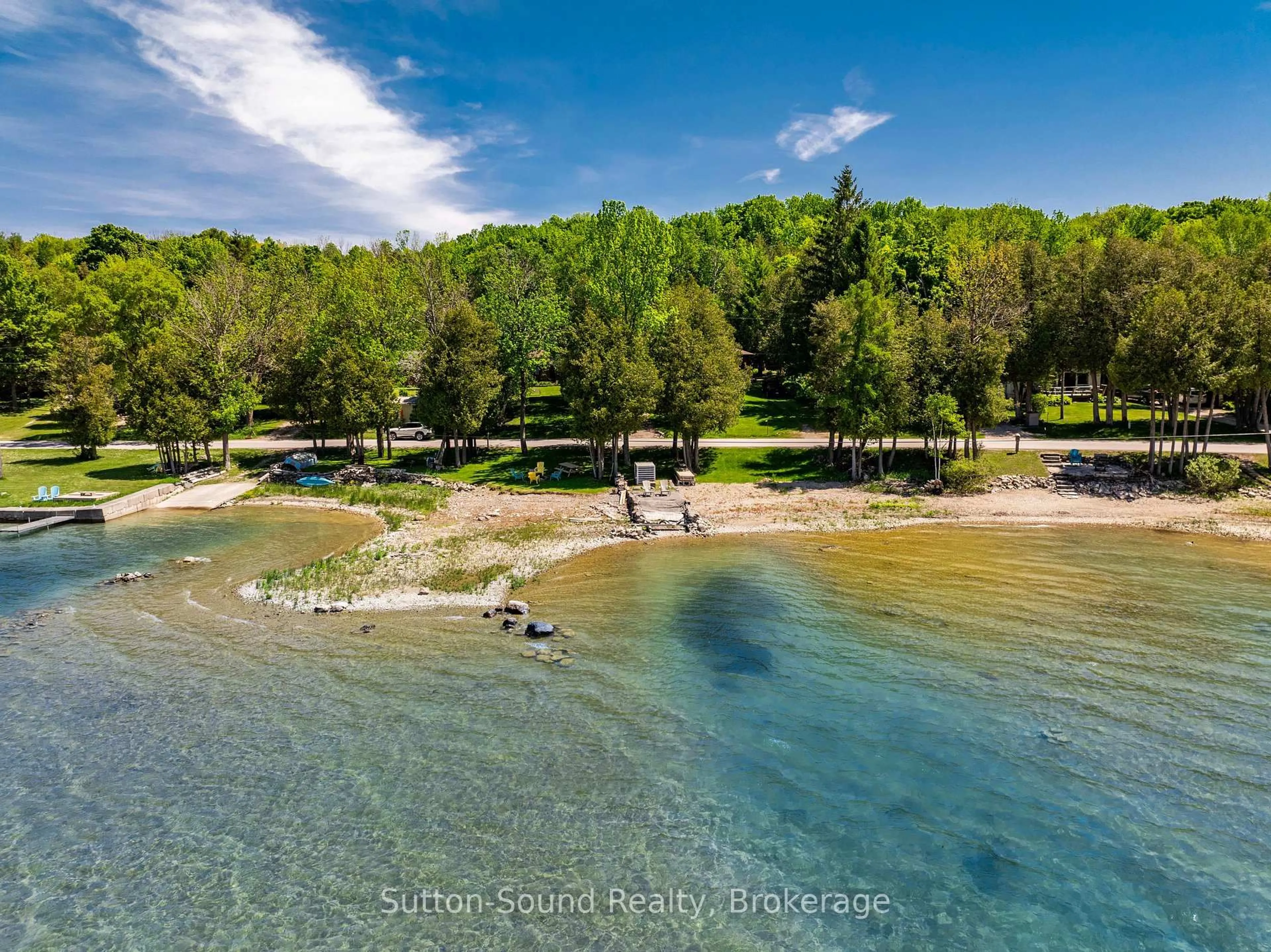 A pic from outside/outdoor area/front of a property/back of a property/a pic from drone, water/lake/river/ocean view for 152 Old Mill Rd, Georgian Bluffs Ontario N0H 2T0
