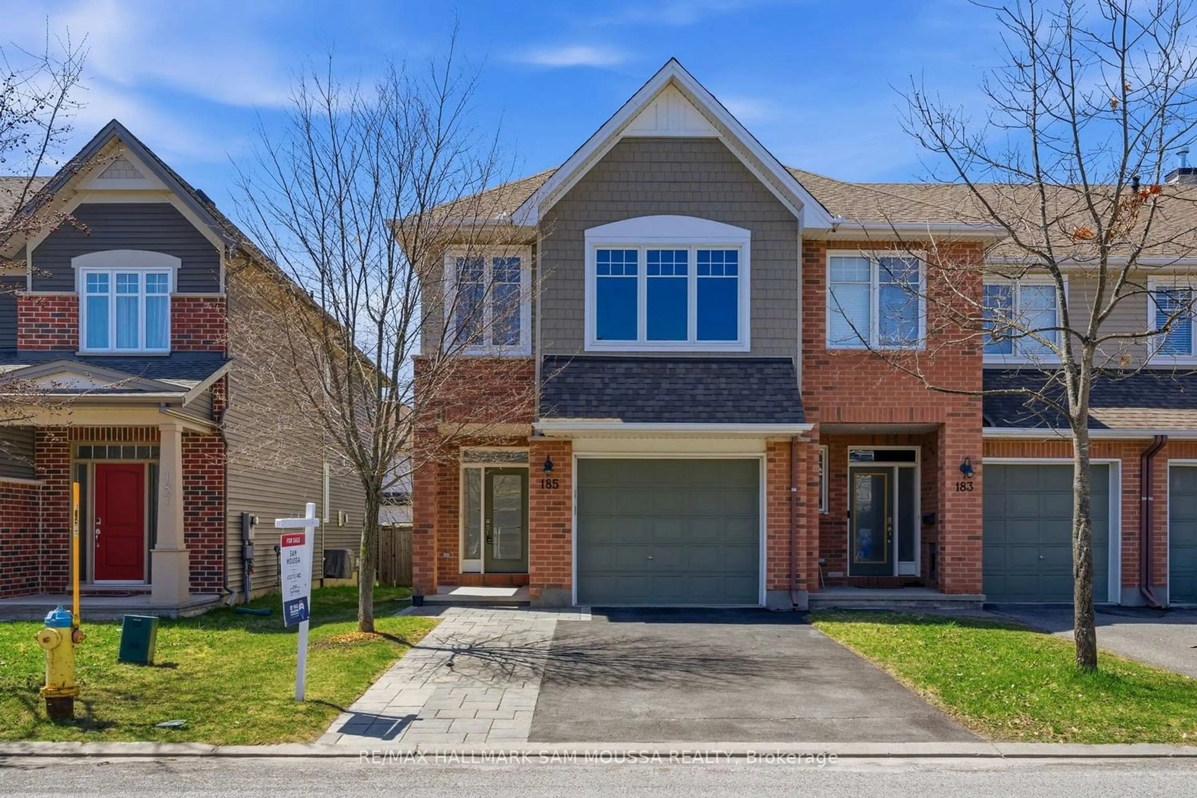 Home with brick exterior material, street for 185 Flat Sedge Cres, Ottawa Ontario K1T 0G9