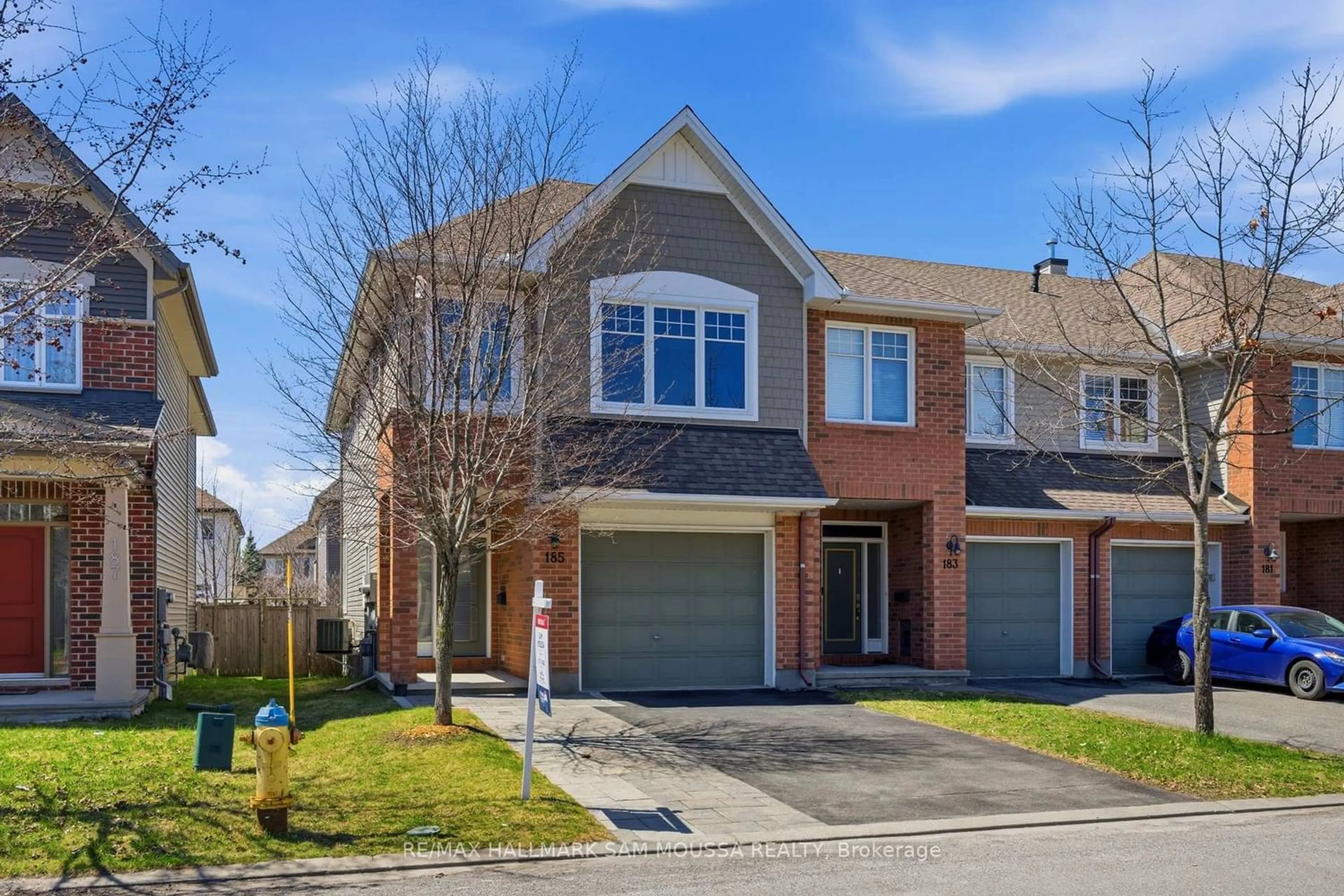 Home with brick exterior material, street for 185 Flat Sedge Cres, Ottawa Ontario K1T 0G9