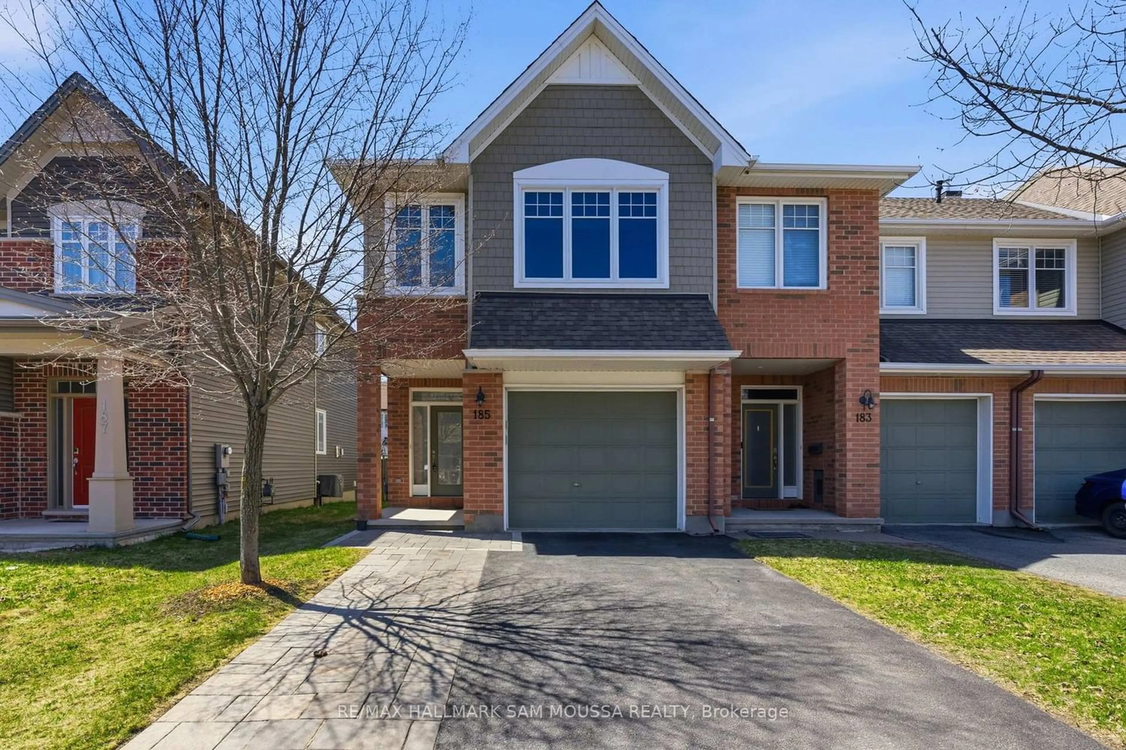 Home with brick exterior material, street for 185 Flat Sedge Cres, Ottawa Ontario K1T 0G9